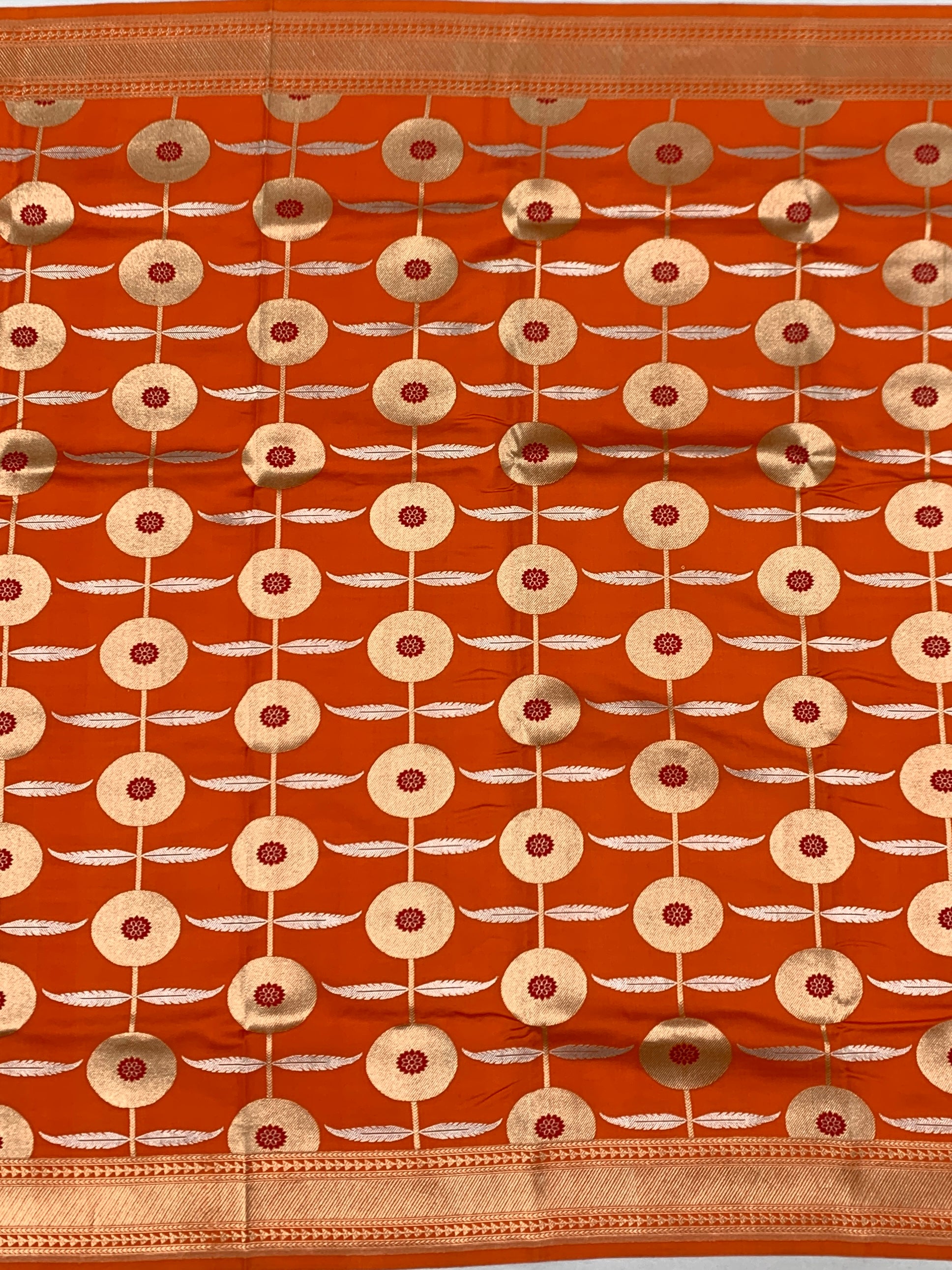 Vibrant Tangerine Orange Chanderi Silk Saree with Zari Floral Motifs