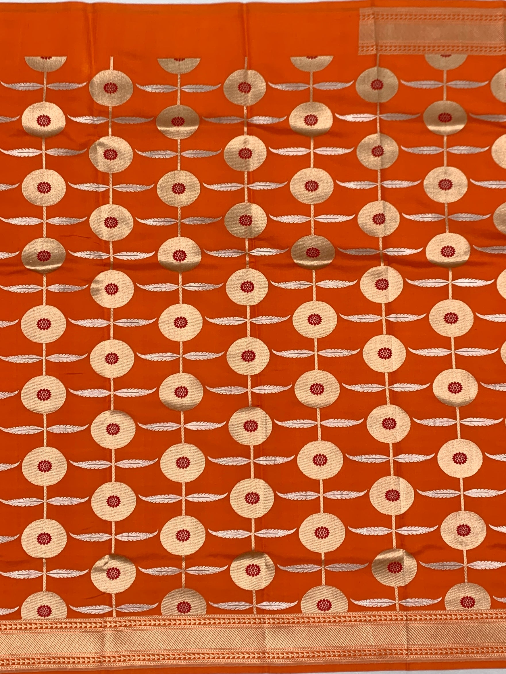 Vibrant Tangerine Orange Chanderi Silk Saree with Zari Floral Motifs