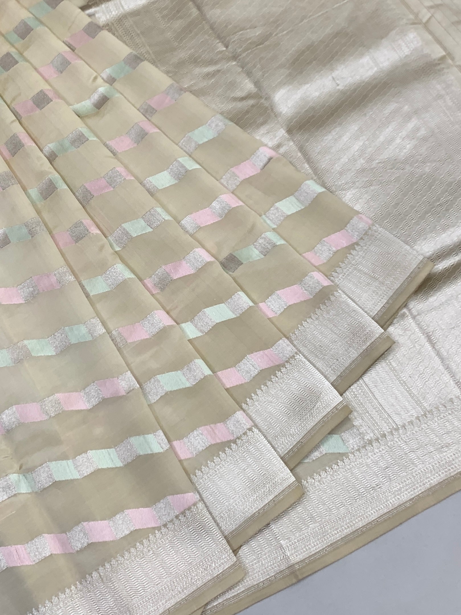 Cream Chanderi Silk Saree with Pastel Chevron Accents