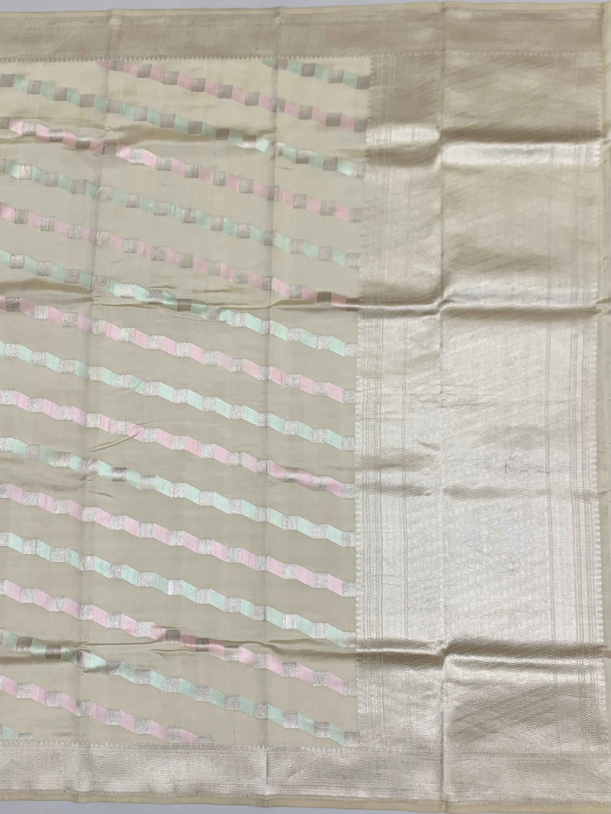 Cream Chanderi Silk Saree with Pastel Chevron Accents