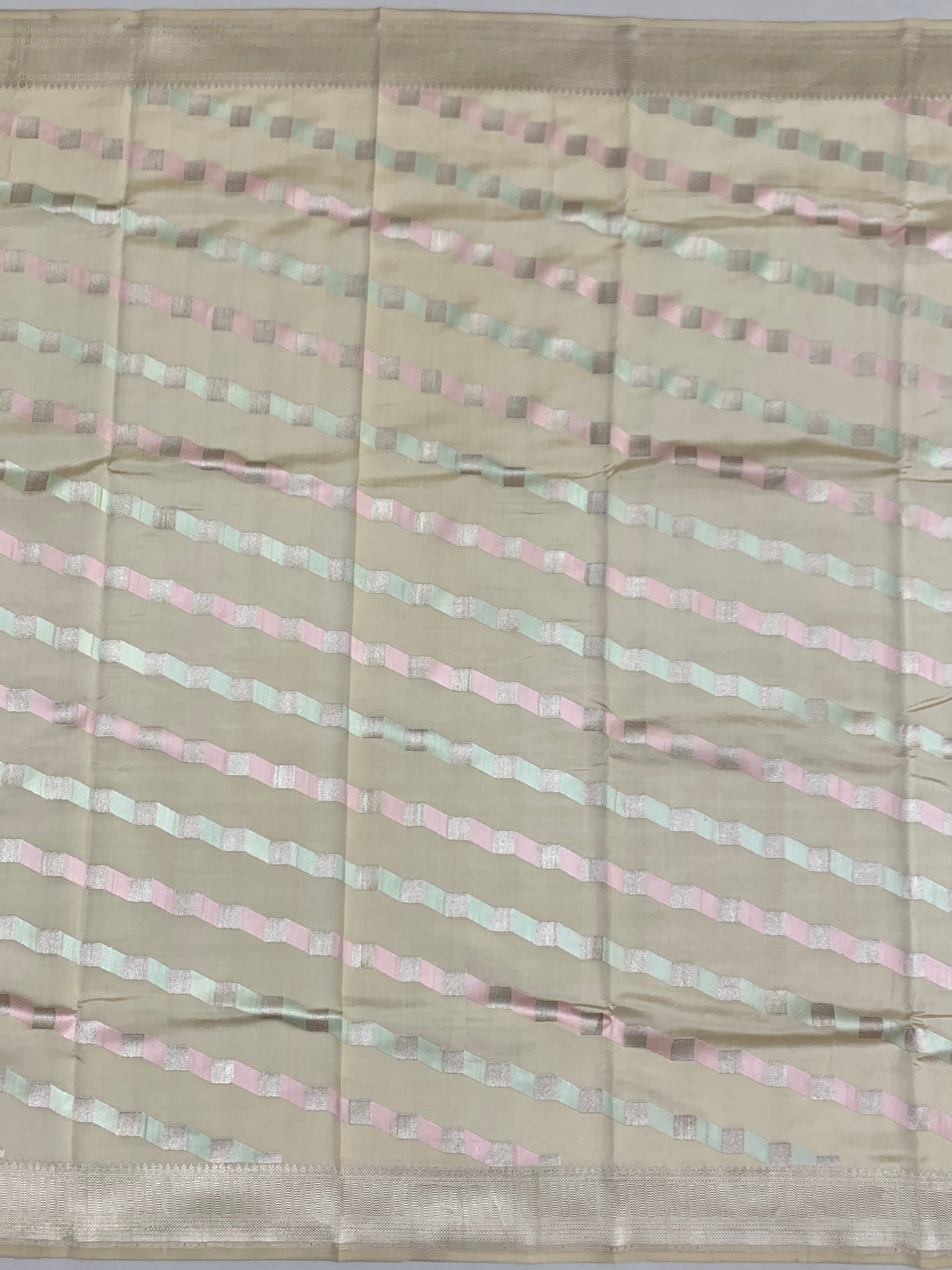 Cream Chanderi Silk Saree with Pastel Chevron Accents