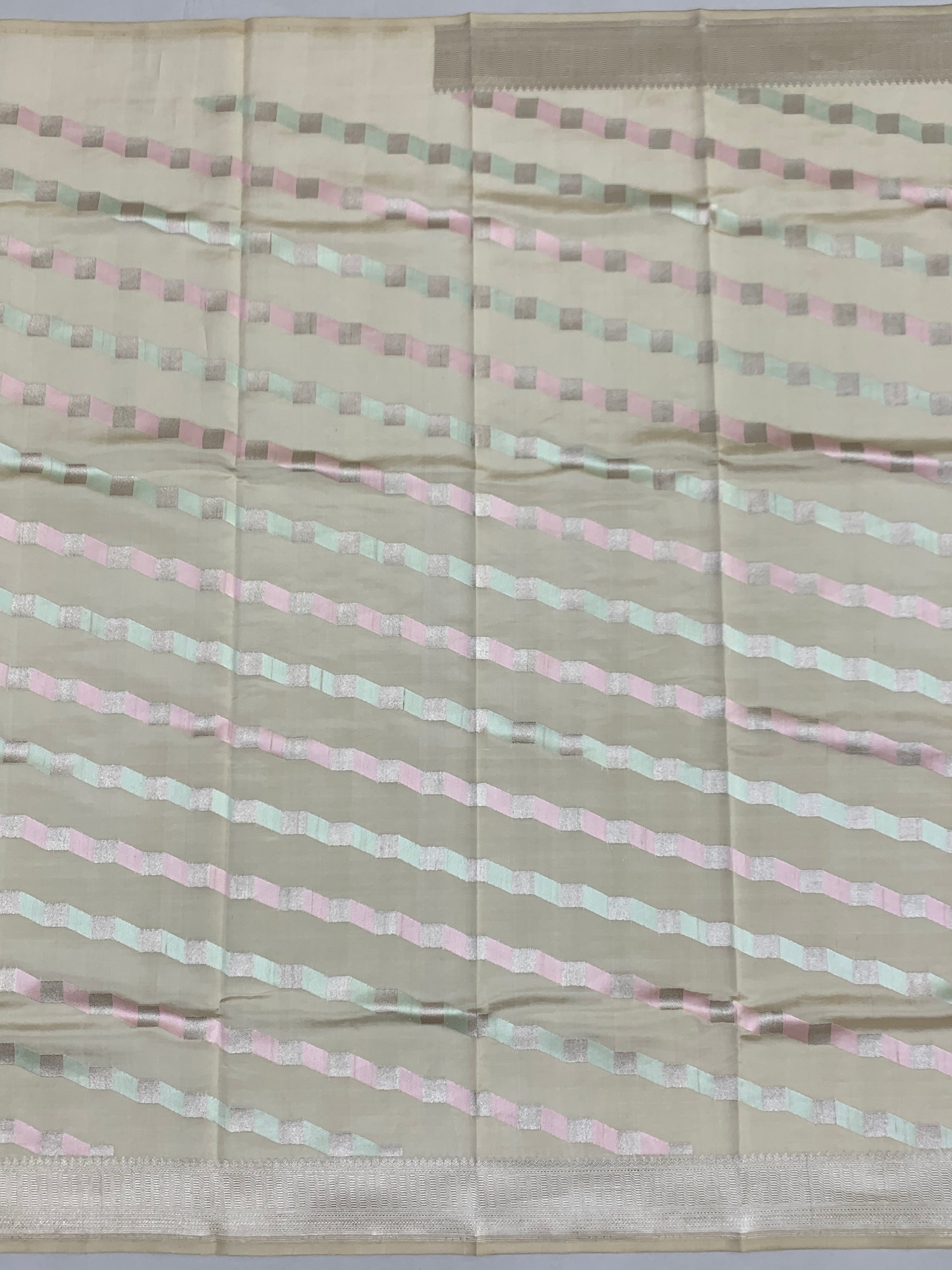 Cream Chanderi Silk Saree with Pastel Chevron Accents