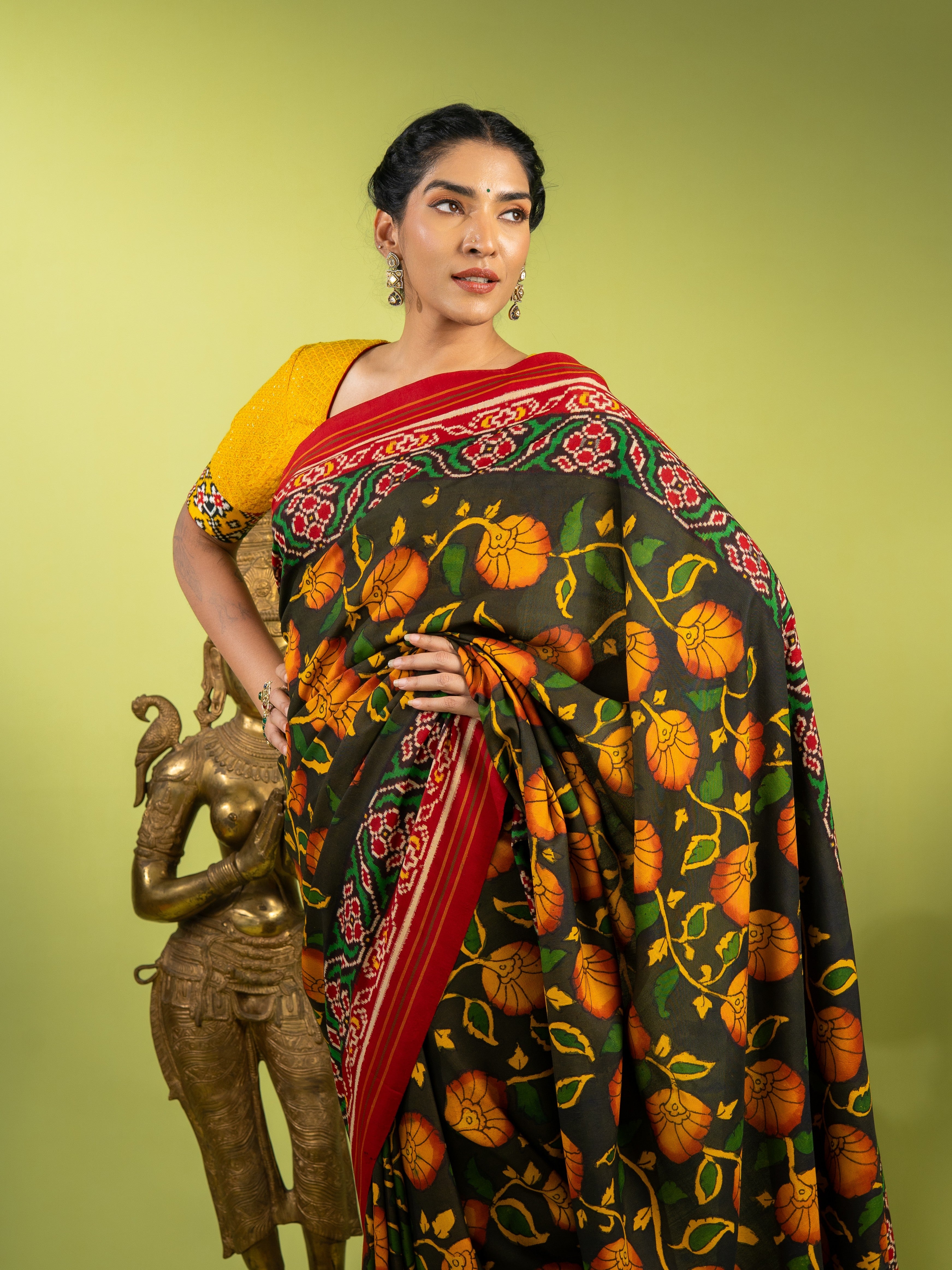 Exclusive Handwoven Patan Patola & Pen Kalamkari Saree