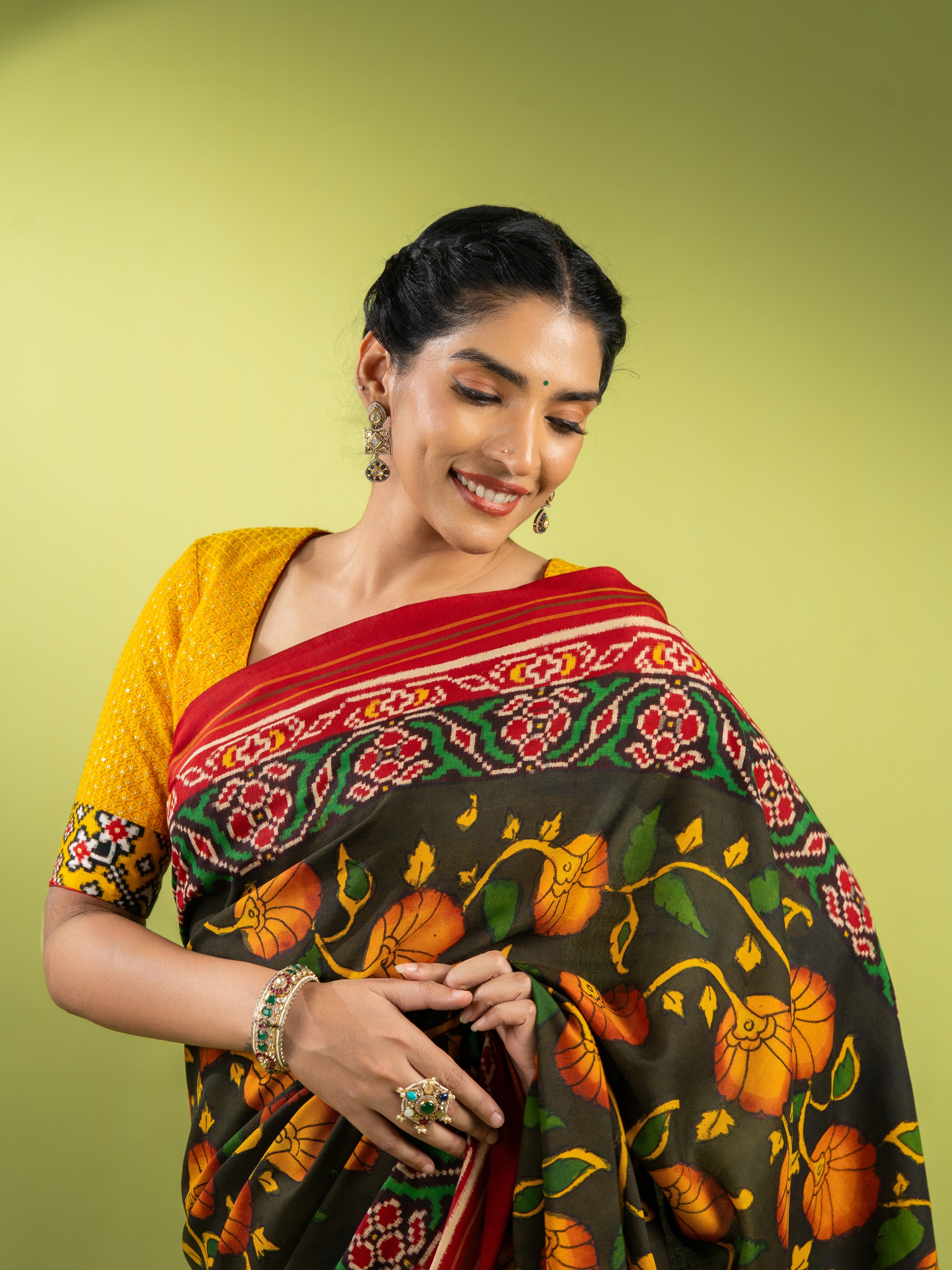 Exclusive Handwoven Patan Patola & Pen Kalamkari Saree