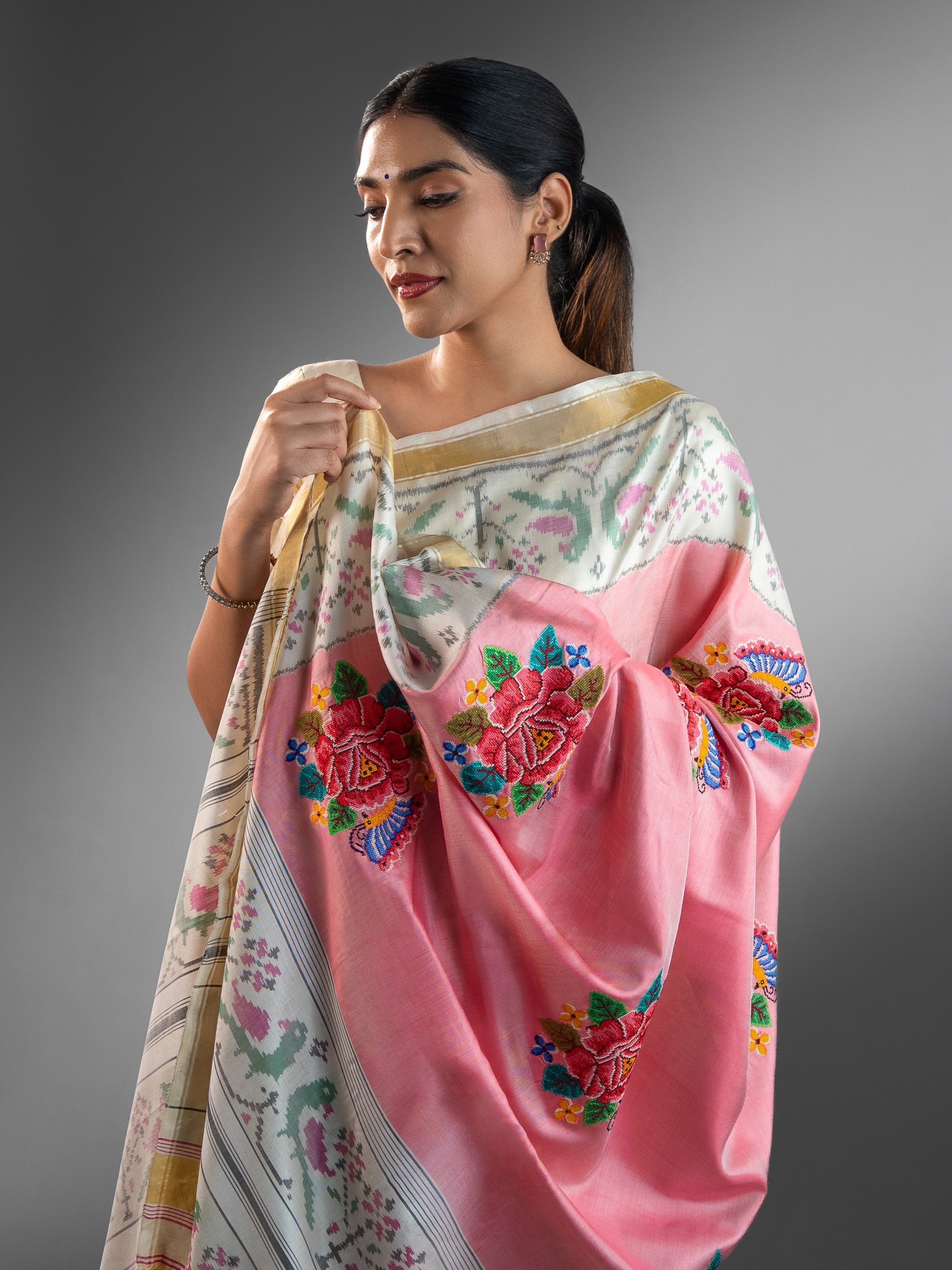 Exquisite Pink Patola Saree with Floral Petite Point Embroidery