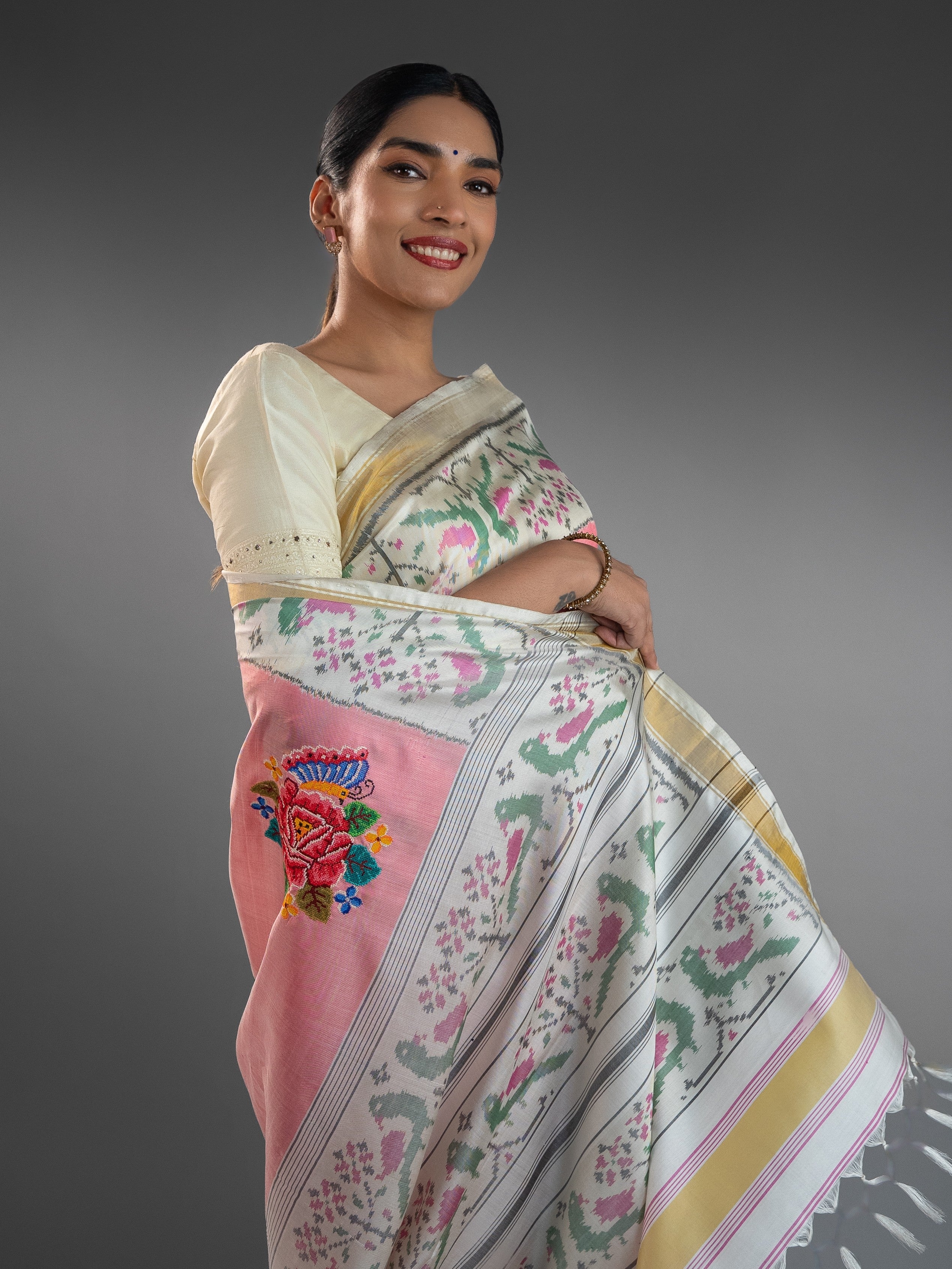 Exquisite Pink Patola Saree with Floral Petite Point Embroidery