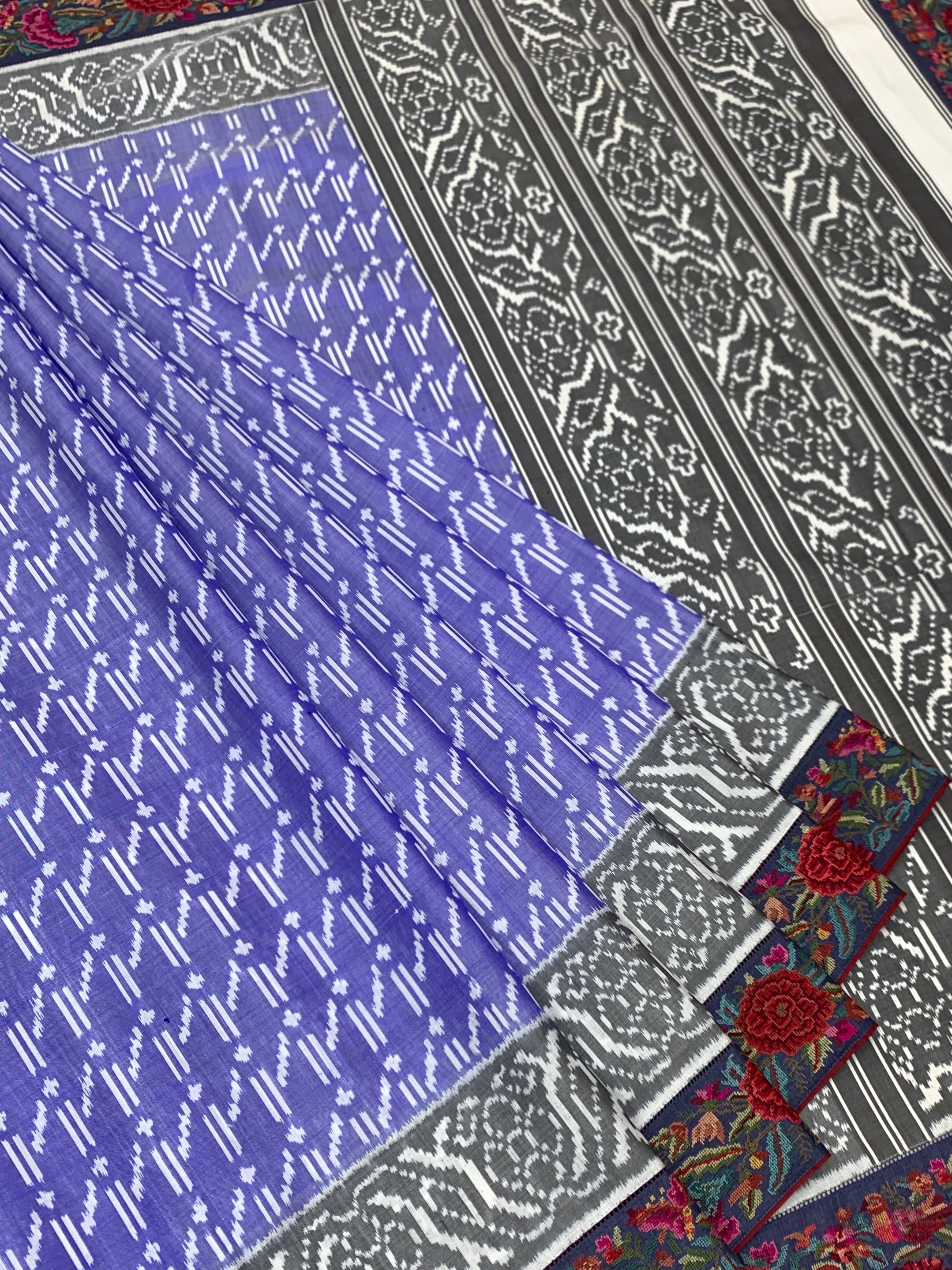 Periwinkle Blue Fusion Patola Silk Saree with Floral Petite Point Embroidery Border