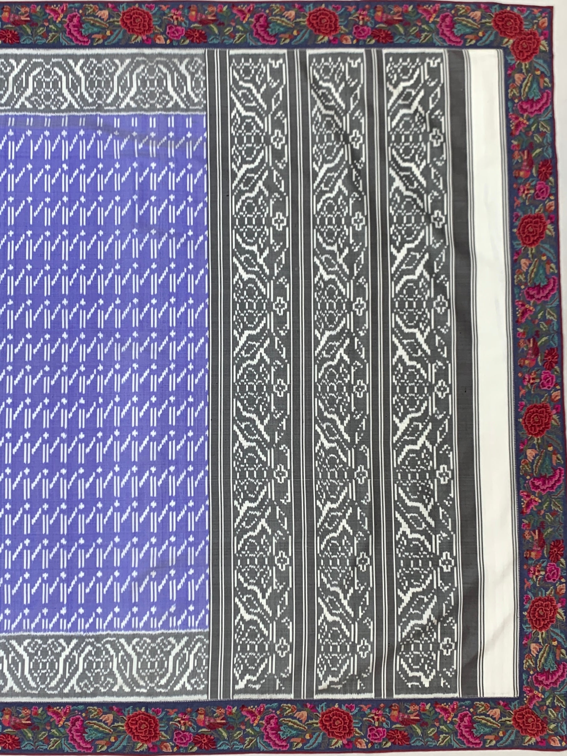 Periwinkle Blue Fusion Patola Silk Saree with Floral Petite Point Embroidery Border