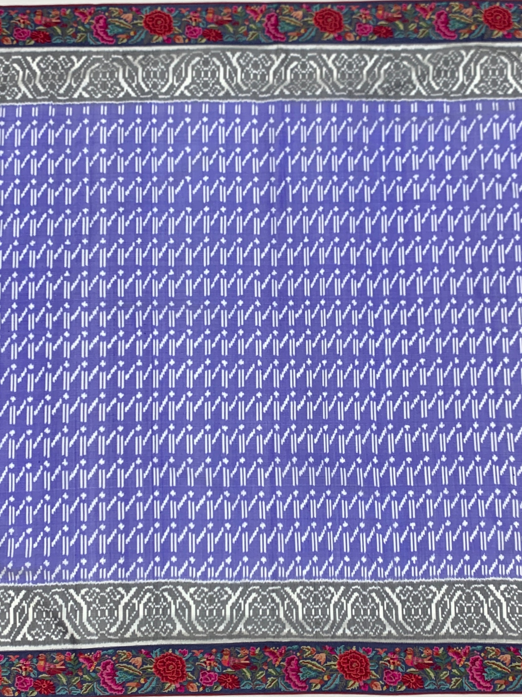 Periwinkle Blue Fusion Patola Silk Saree with Floral Petite Point Embroidery Border