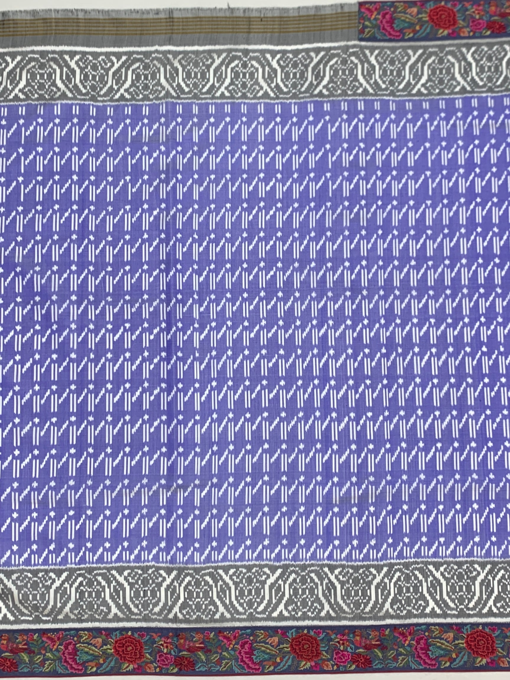 Periwinkle Blue Fusion Patola Silk Saree with Floral Petite Point Embroidery Border