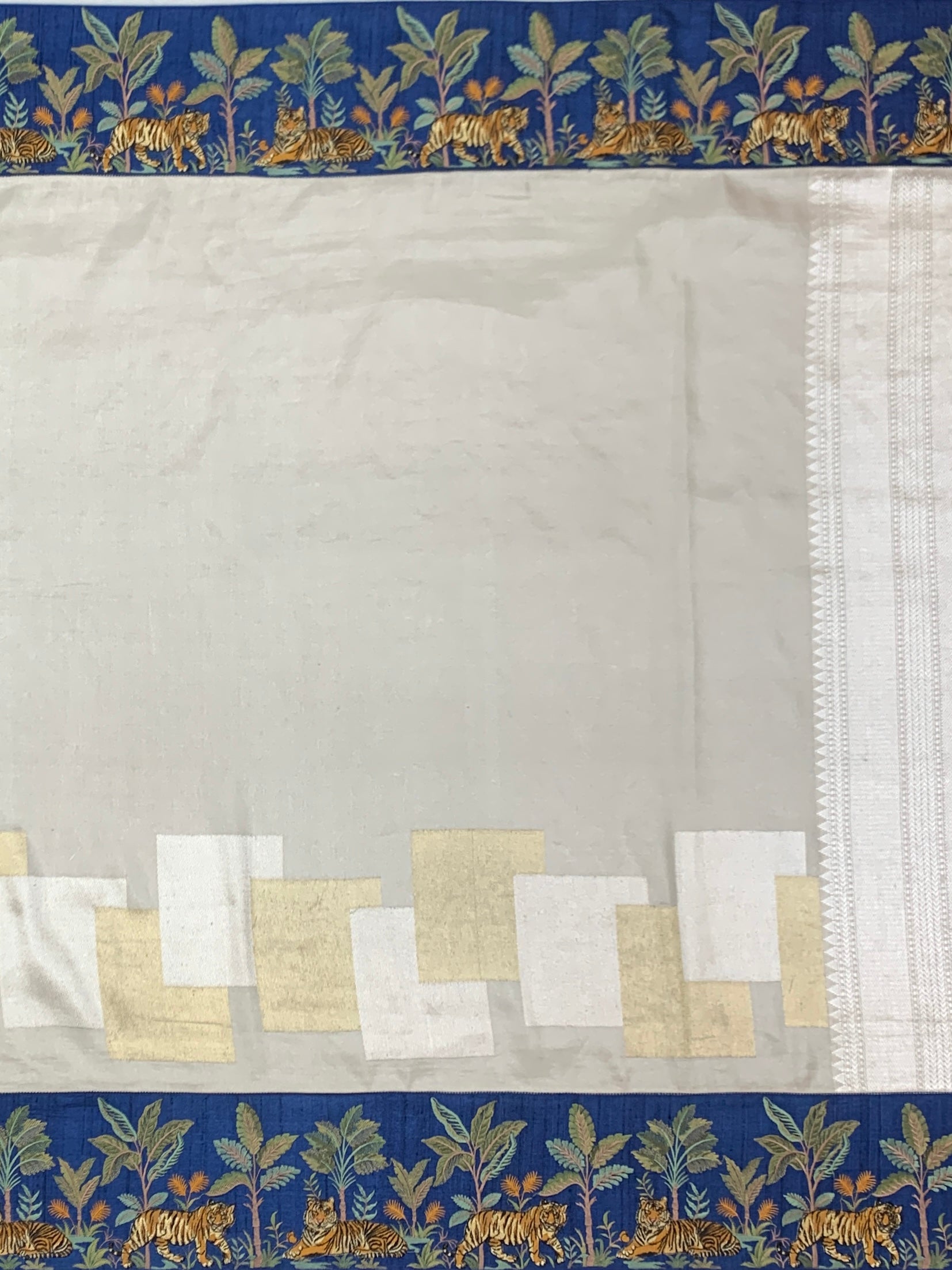 Majestic Wilderness: Fusion Tissue Banarasi Saree with Embroidered Border
