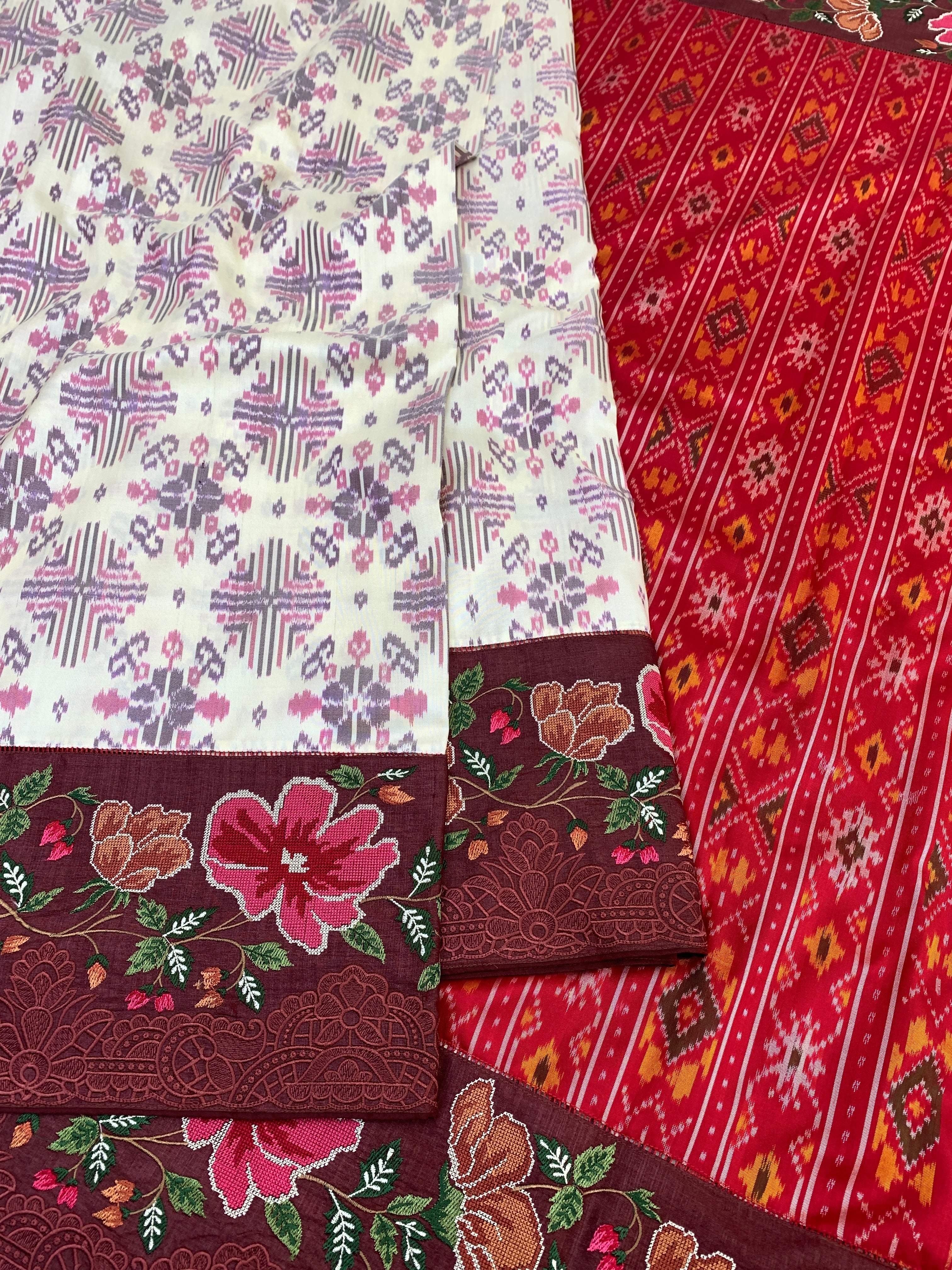 The Heritage Fusion: Cream & Ruby Patola Saree with Floral Embroidered Borders
