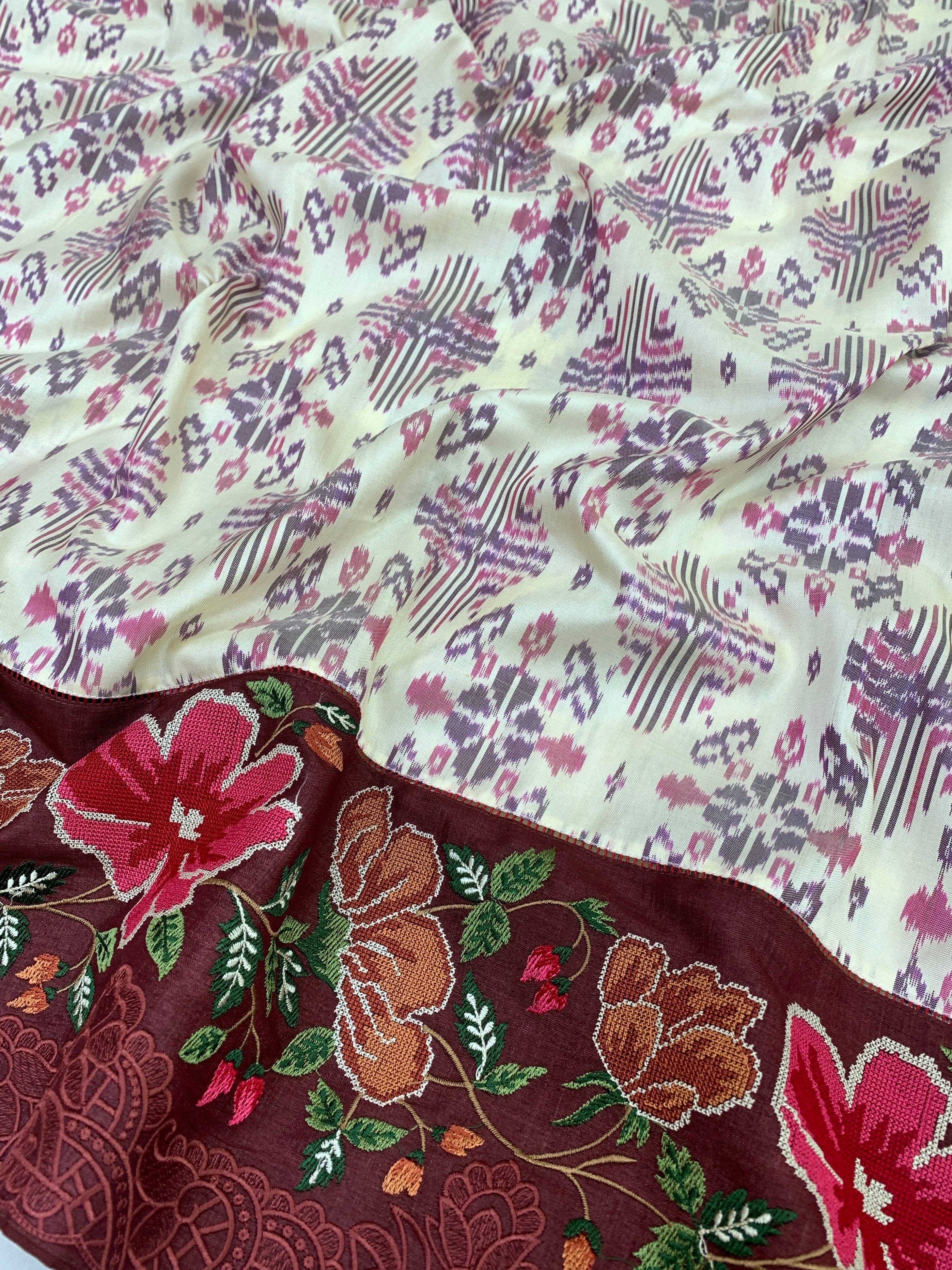 The Heritage Fusion: Cream & Ruby Patola Saree with Floral Embroidered Borders