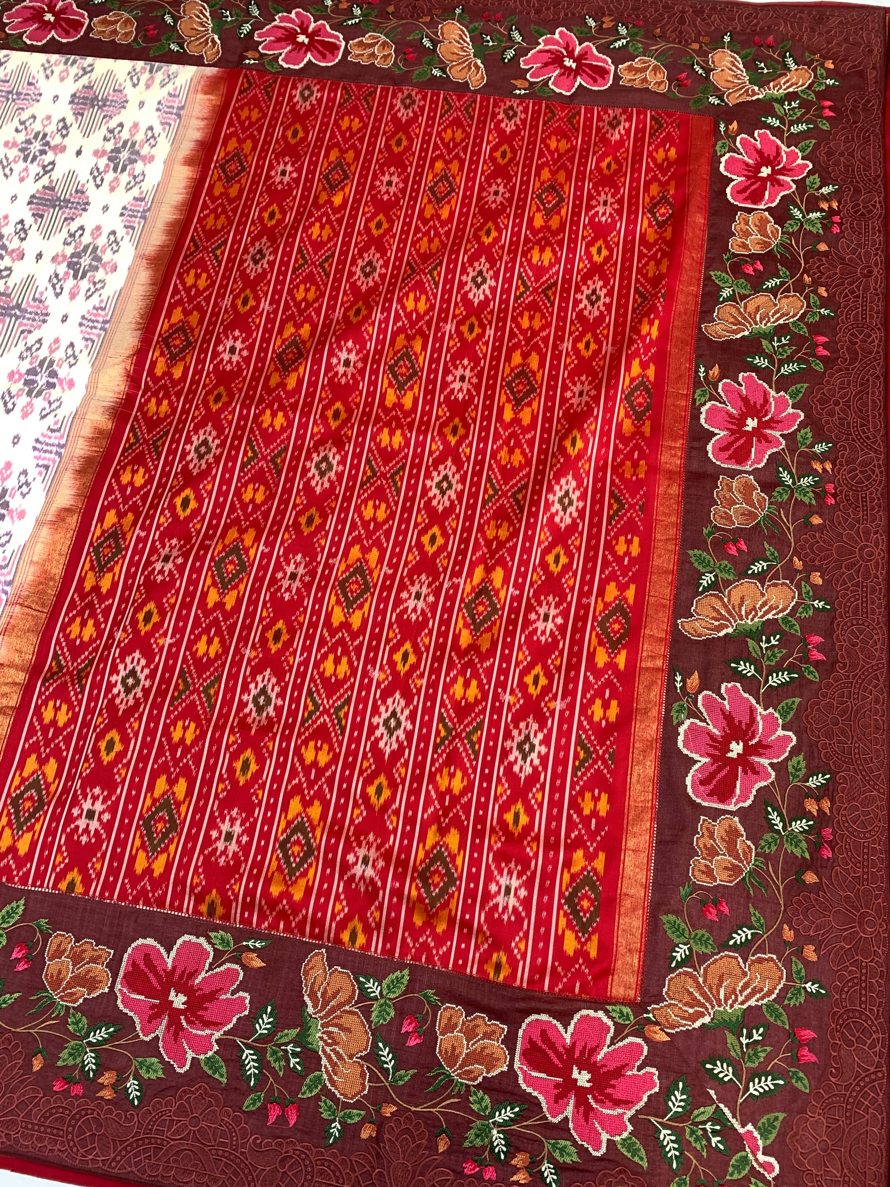 The Heritage Fusion: Cream & Ruby Patola Saree with Floral Embroidered Borders