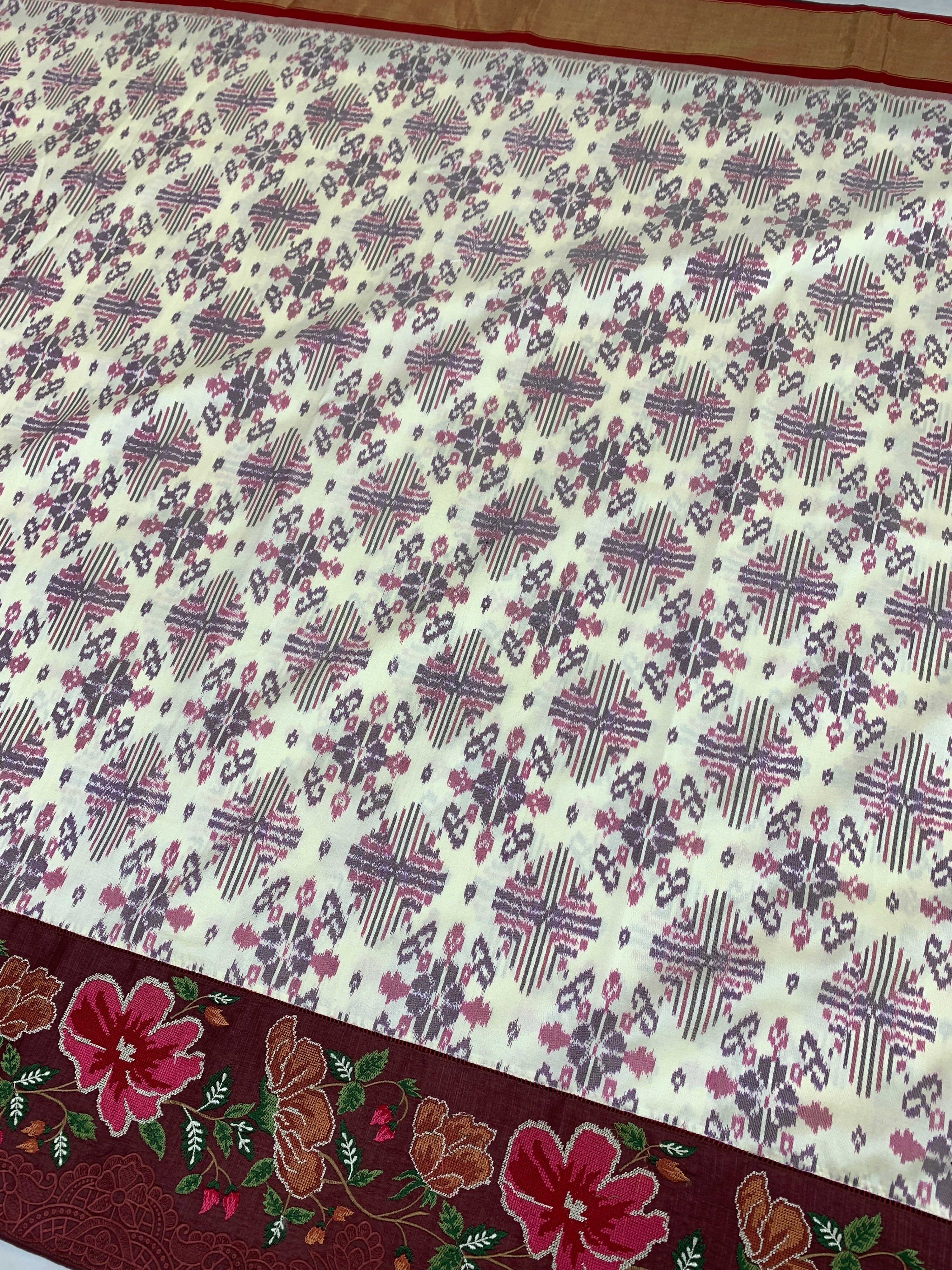 The Heritage Fusion: Cream & Ruby Patola Saree with Floral Embroidered Borders