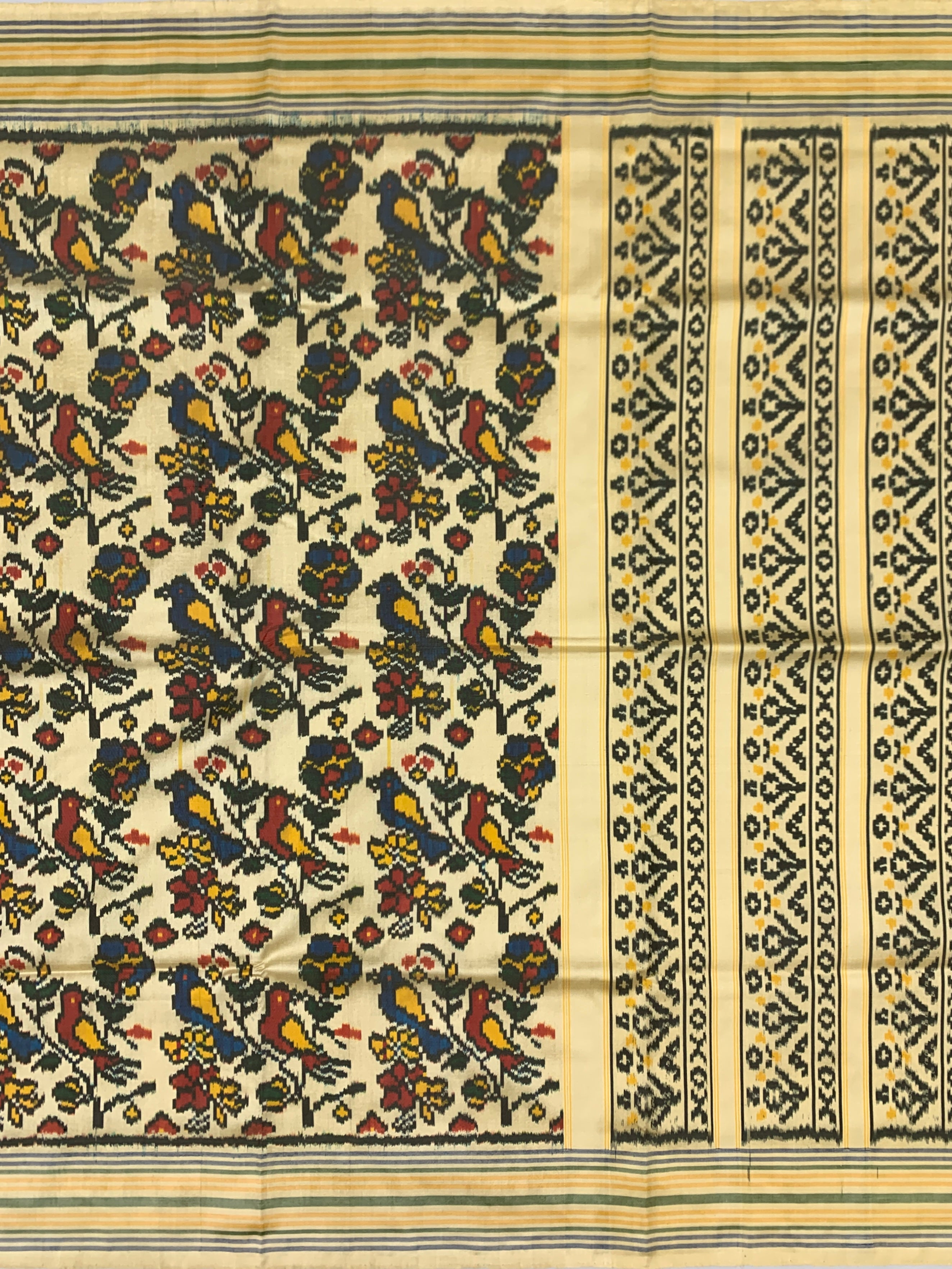 Handcrafted Cream Toned Ikat Silk Saree
