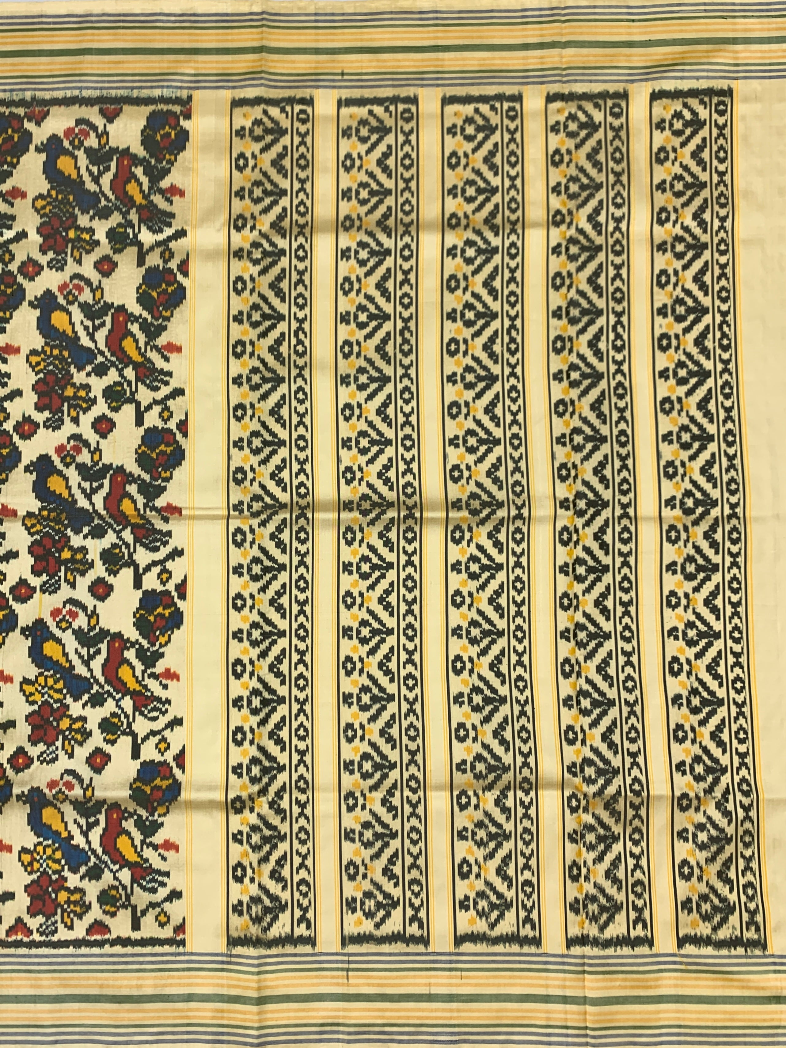 Handcrafted Cream Toned Ikat Silk Saree