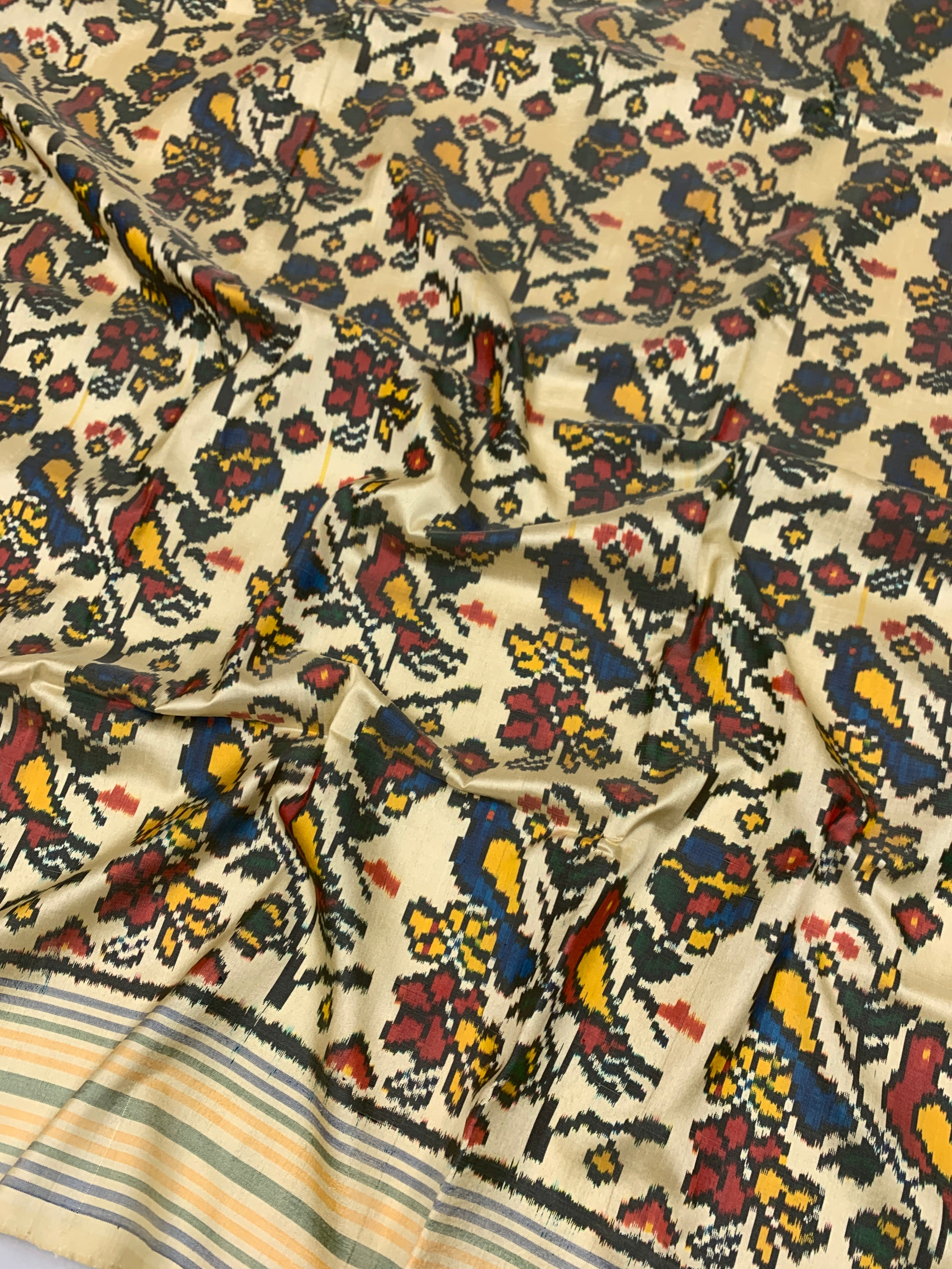Handcrafted Cream Toned Ikat Silk Saree