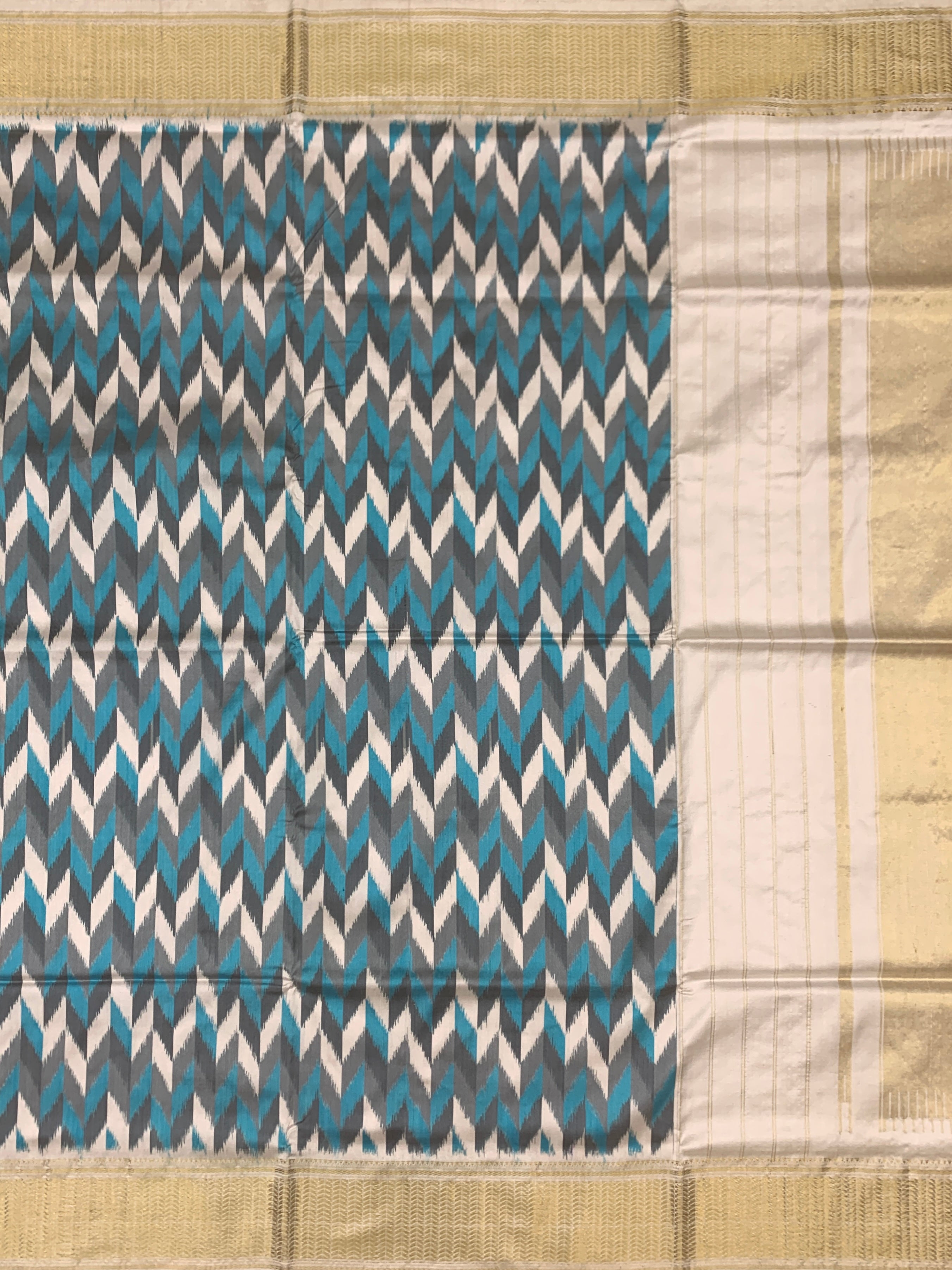 Handcrafted Ikat Silk Saree in Steel Grey and Cerulean Blue