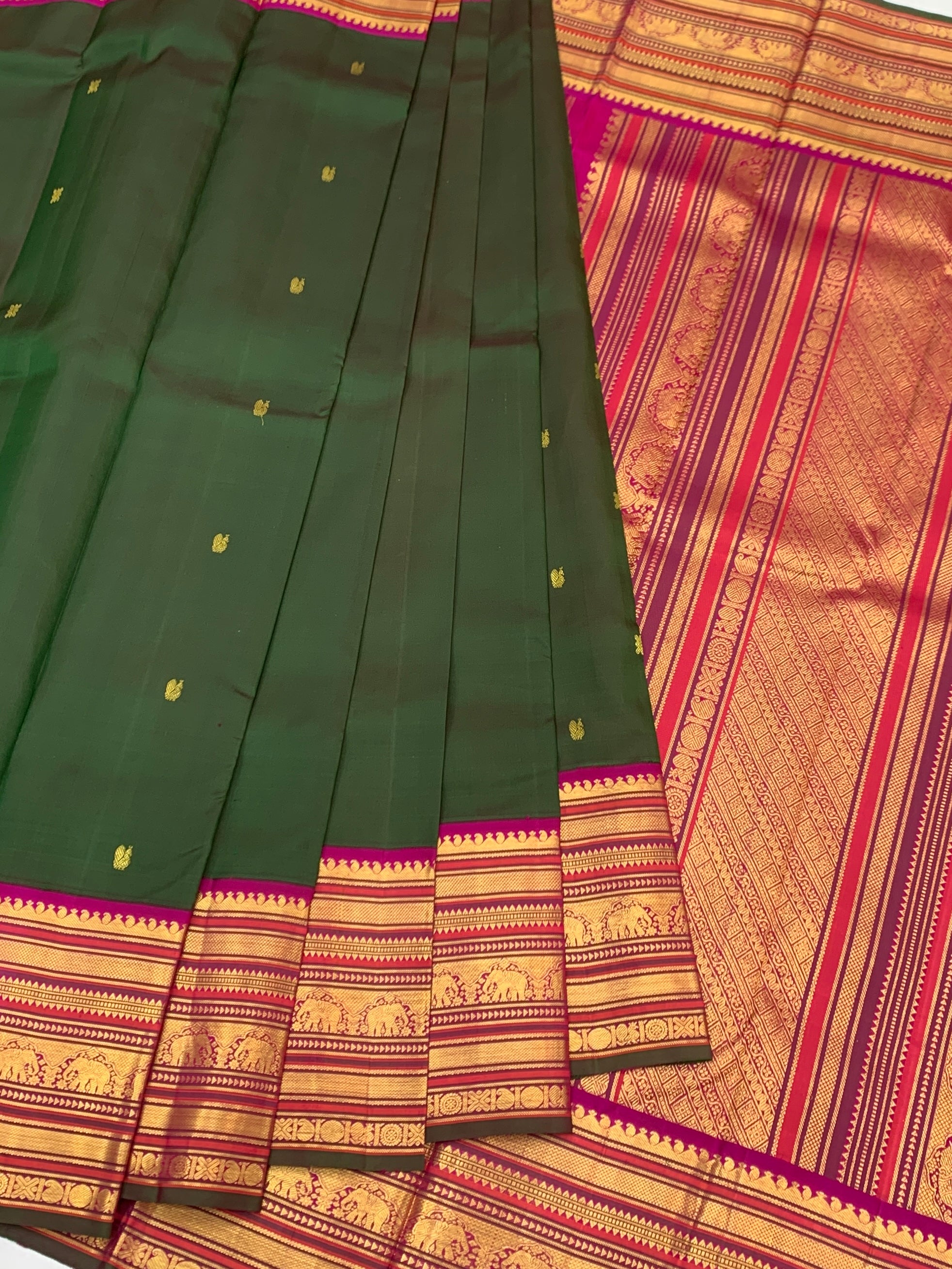 Exquisite Bottle Green and Rani Pink Kanjeevaram Silk Saree