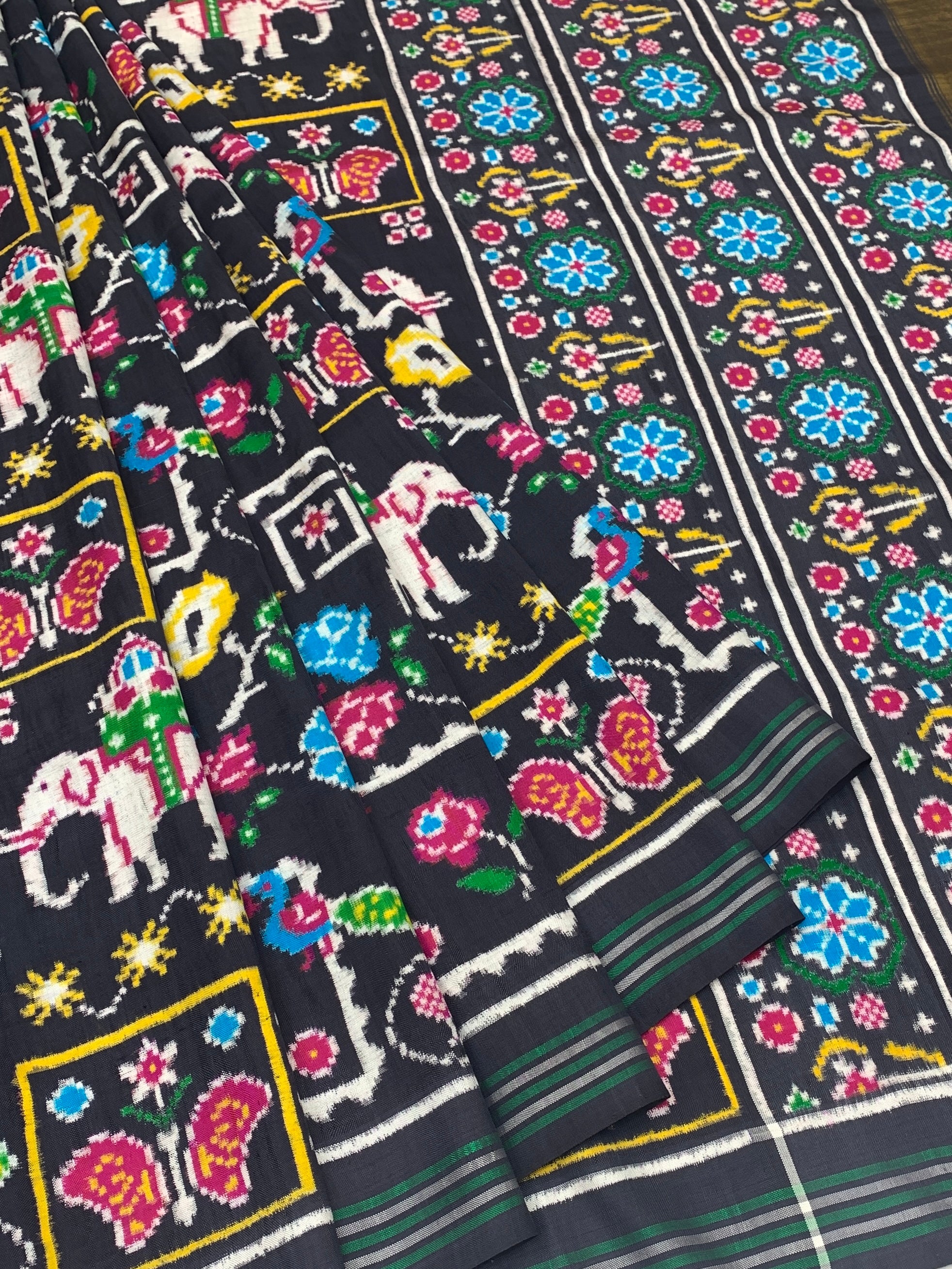 Exquisite Handwoven Patan Patola Silk Saree – Royal Black with Ceremonial Elephant & Cyan Floral Pallu
