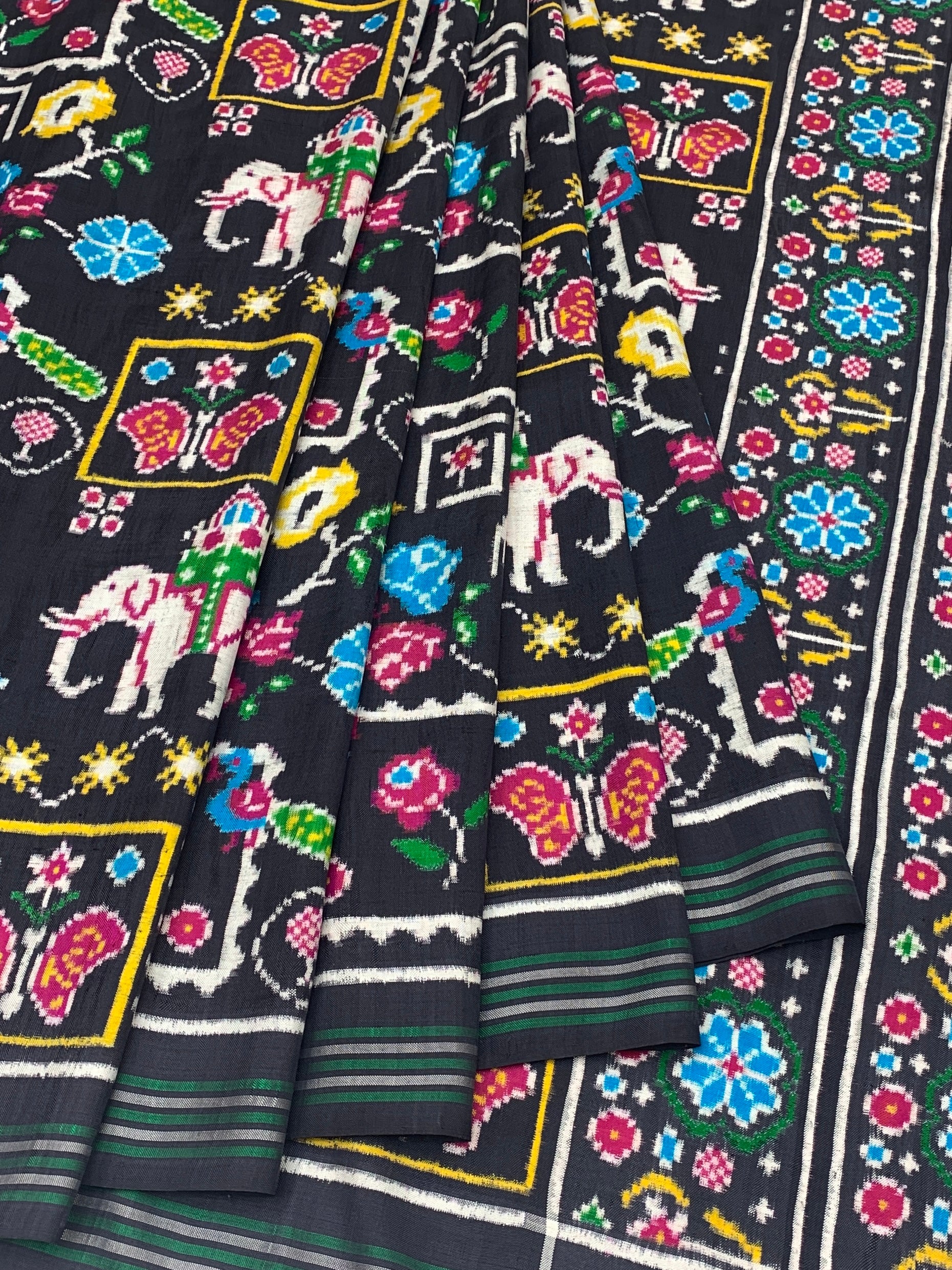 Exquisite Handwoven Patan Patola Silk Saree – Royal Black with Ceremonial Elephant & Cyan Floral Pallu
