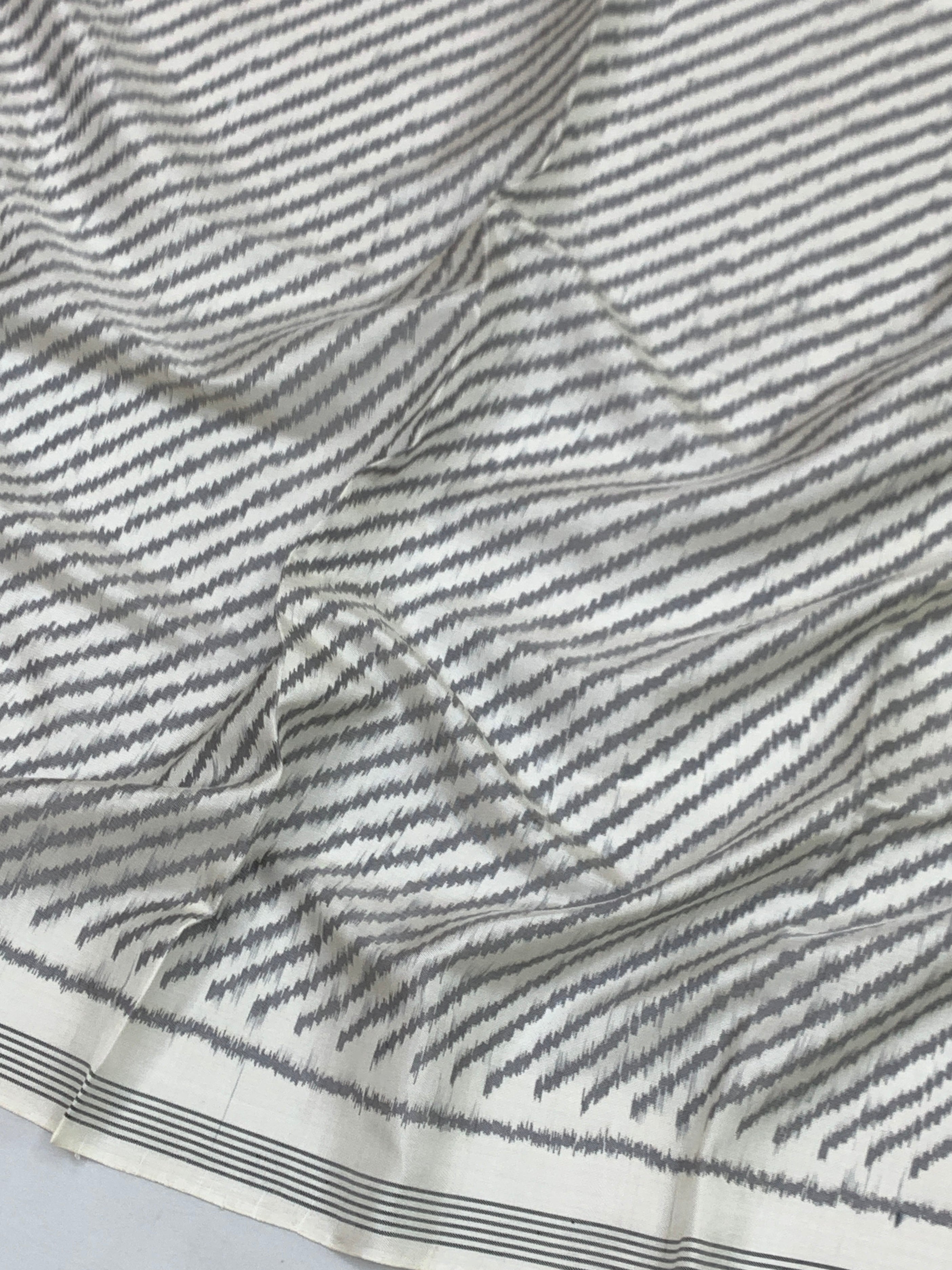 Monochrome Magic: Slate Leheriya & Emerald Parrot Patola Saree