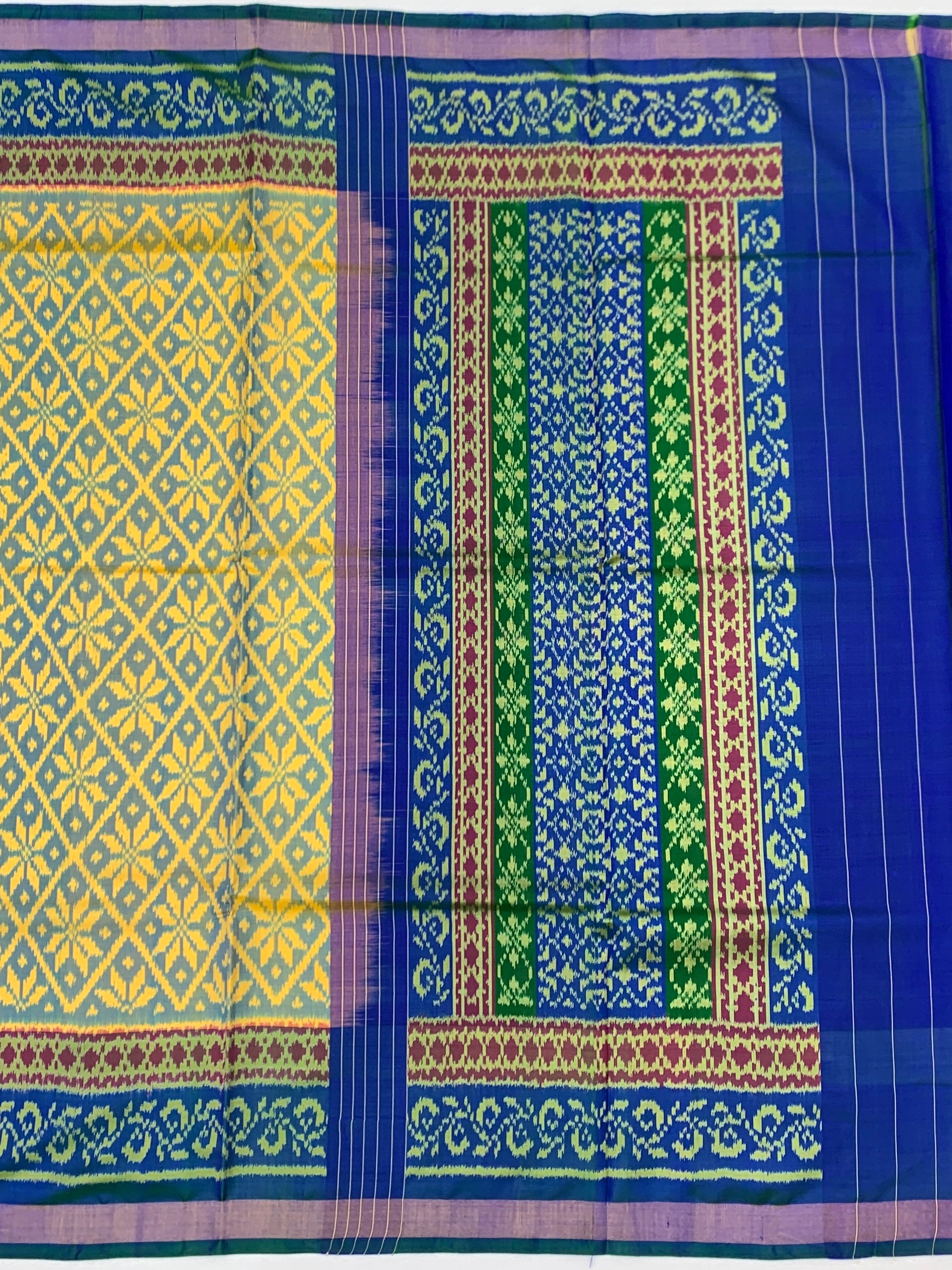 Exquisite Rajkot Single Ikat Patola Saree in Sunbeam Yellow & Royal Blue