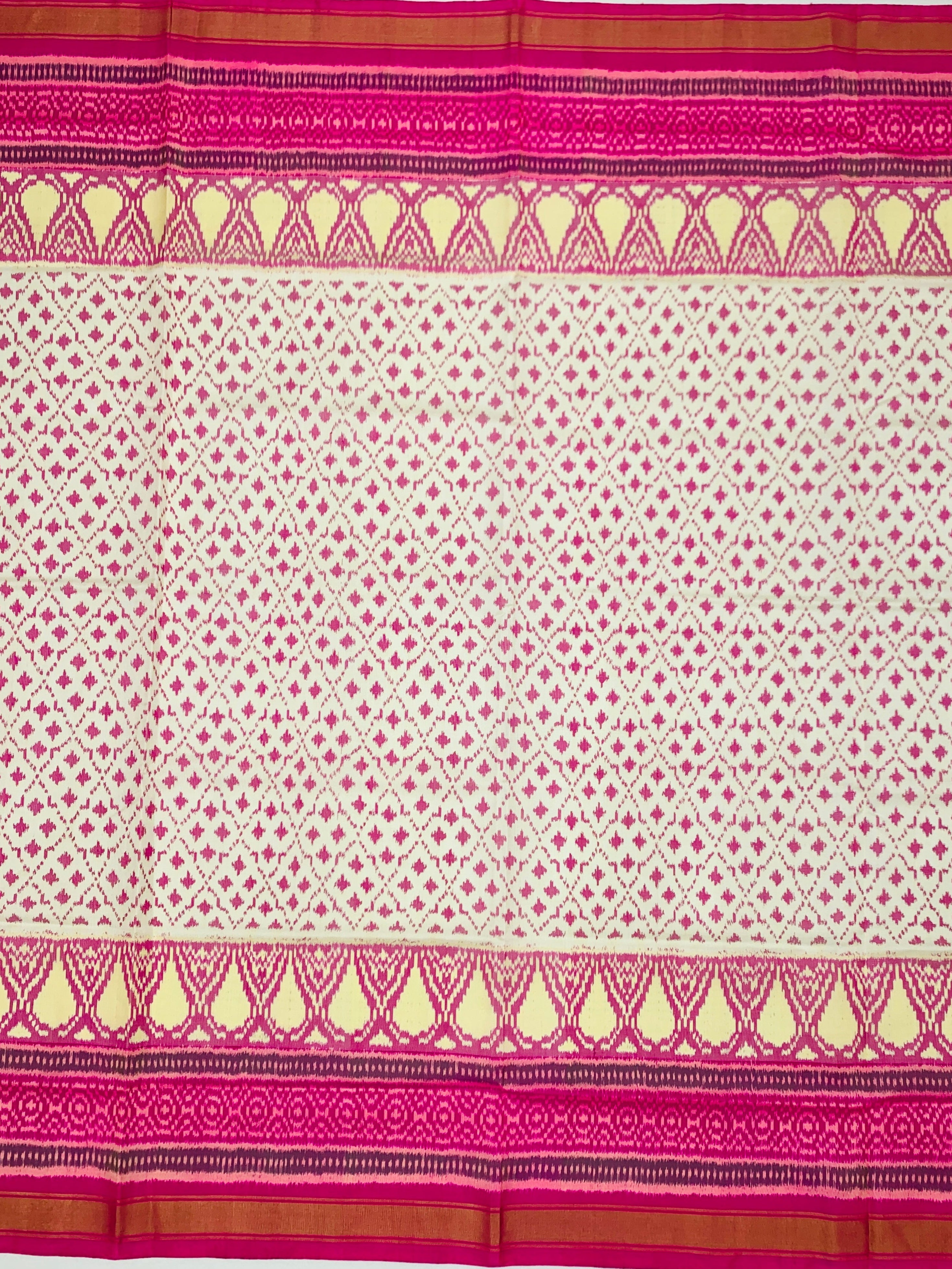 Exquisite Cream & Rani Pink Rajkot Patola Silk Saree