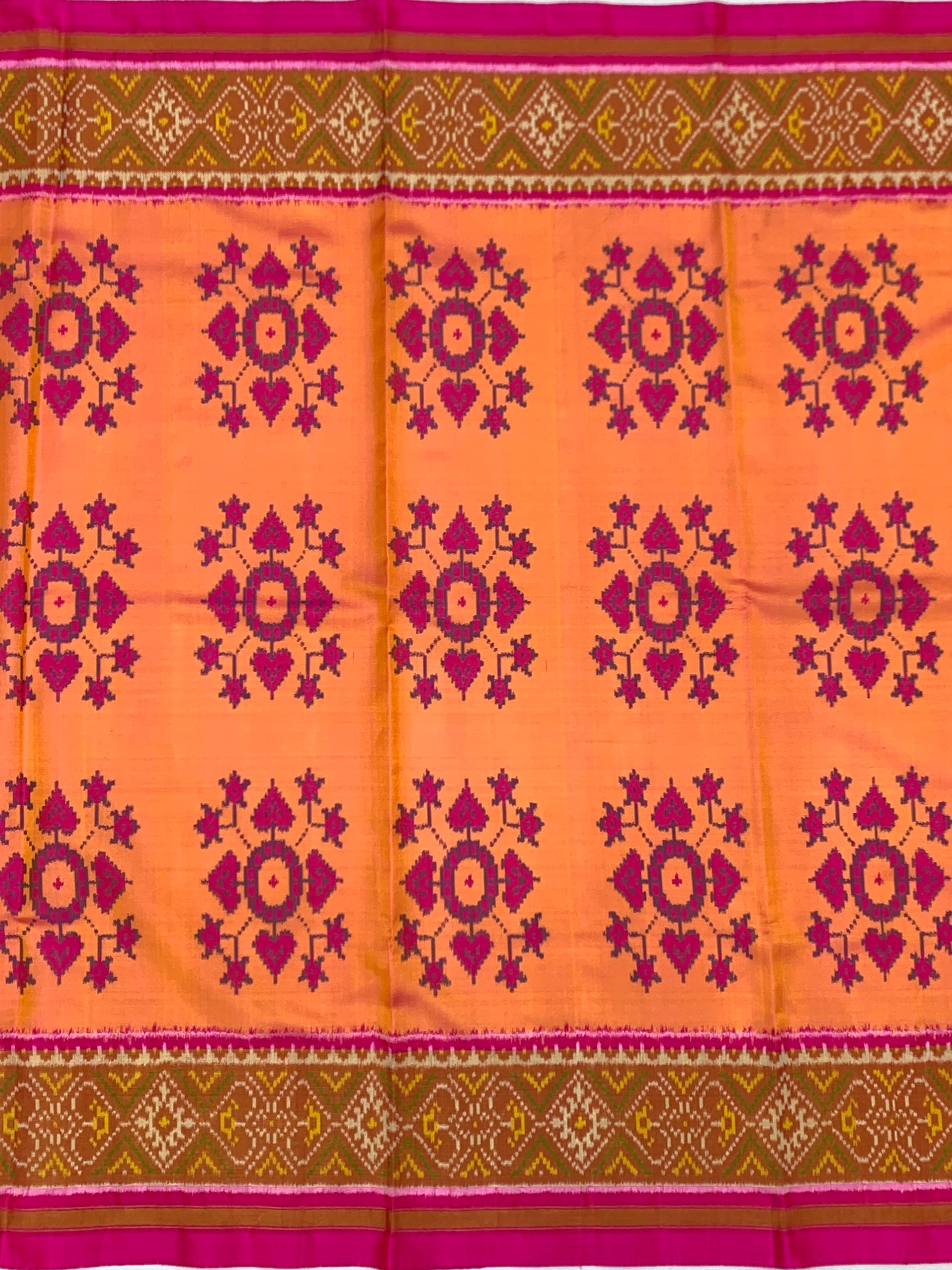 Radiant Sunset Peach & Rani Magenta Rajkot Patola Silk Saree