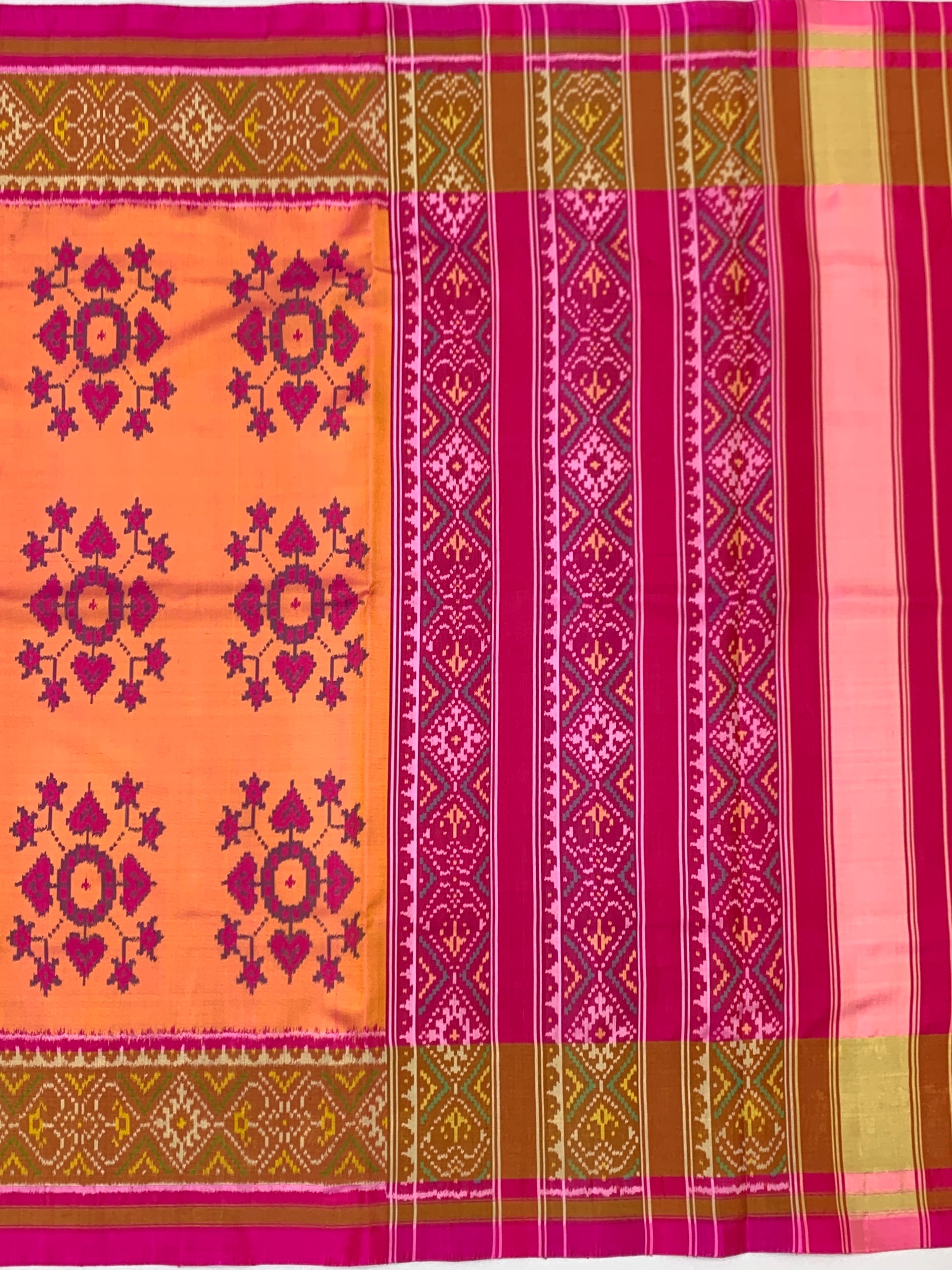 Radiant Sunset Peach & Rani Magenta Rajkot Patola Silk Saree