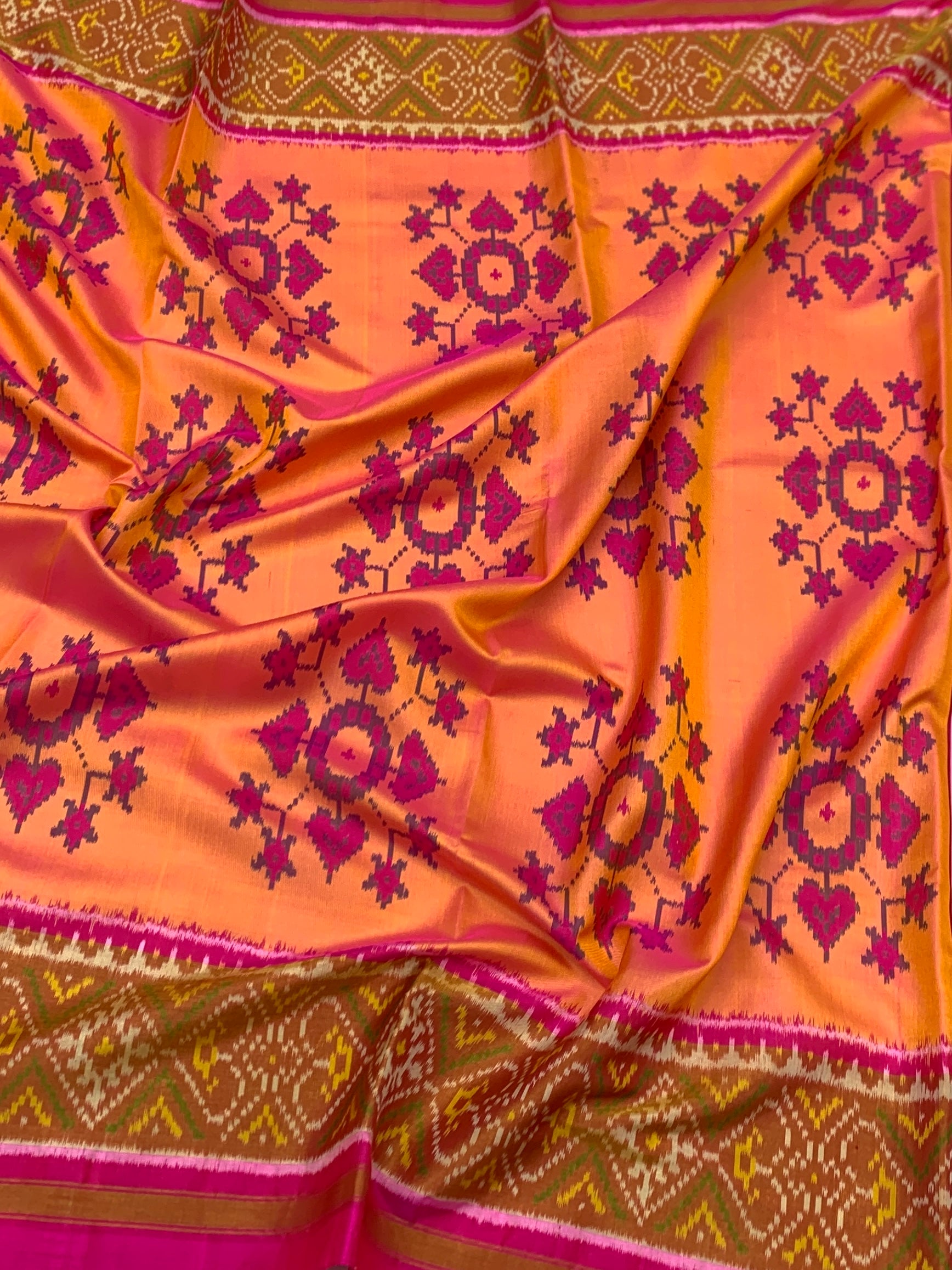 Radiant Sunset Peach & Rani Magenta Rajkot Patola Silk Saree