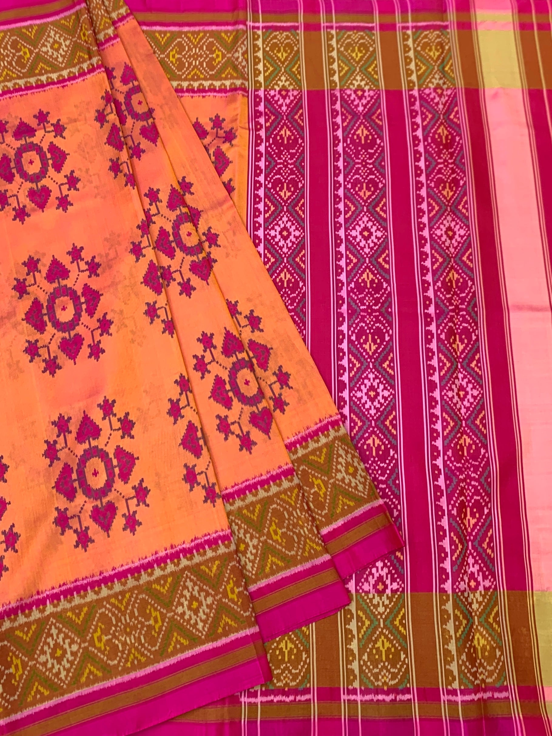 Radiant Sunset Peach & Rani Magenta Rajkot Patola Silk Saree