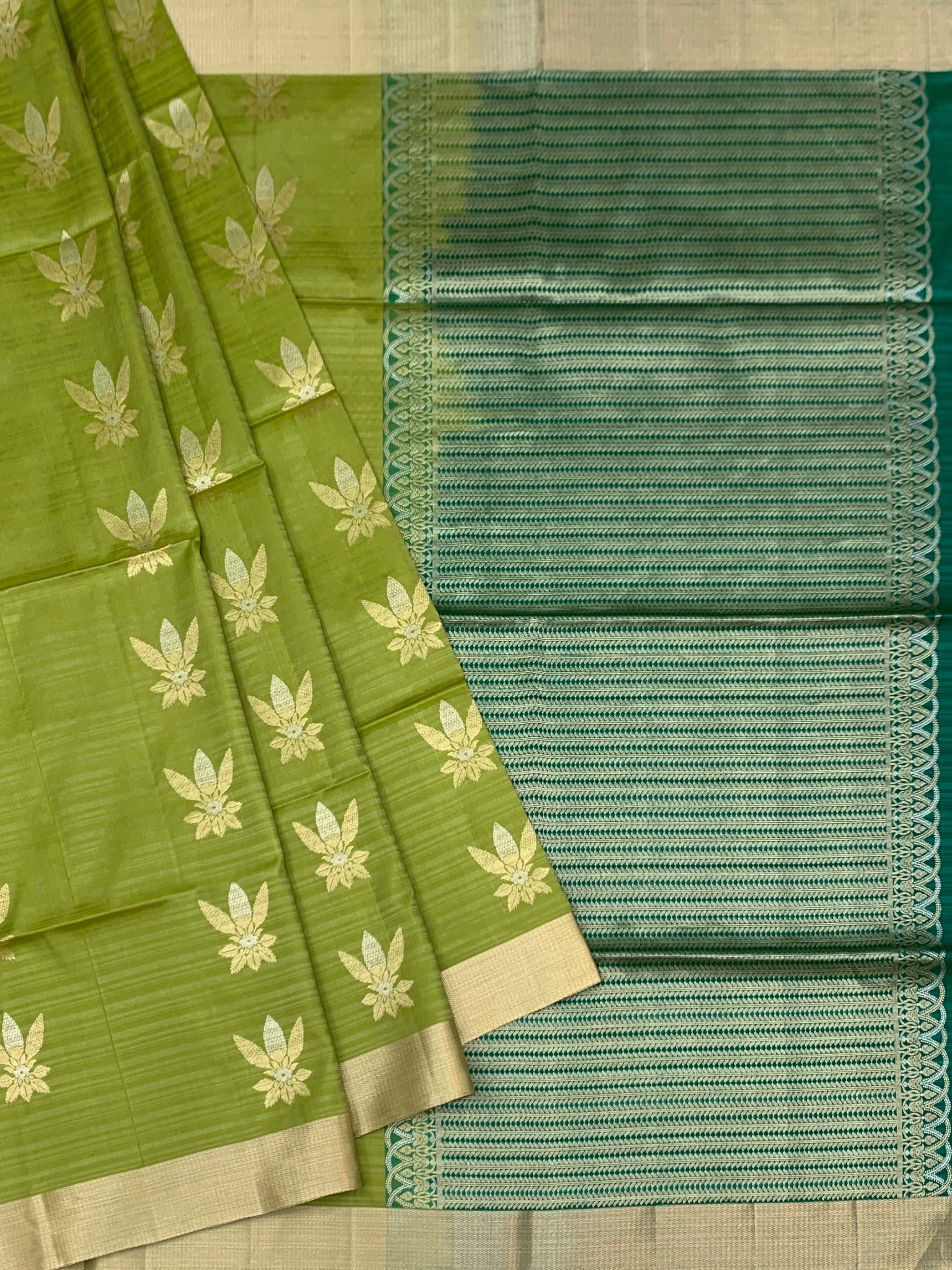 Radiant Light Green & Emerald Soft Silk Saree with Floral Zari Motifs