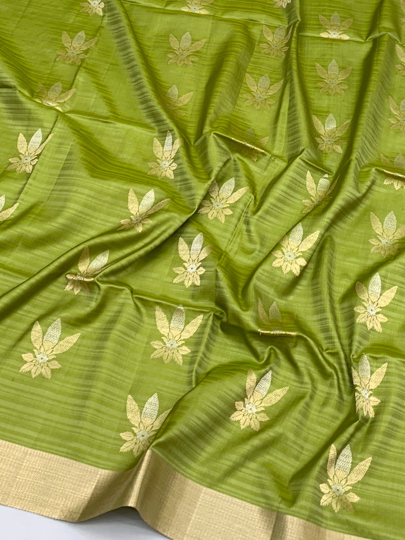 Radiant Light Green & Emerald Soft Silk Saree with Floral Zari Motifs