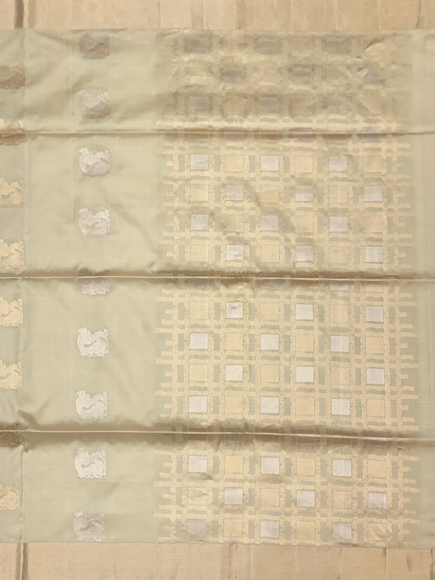 Elegant Ivory Soft Silk Saree with Geometric Weave