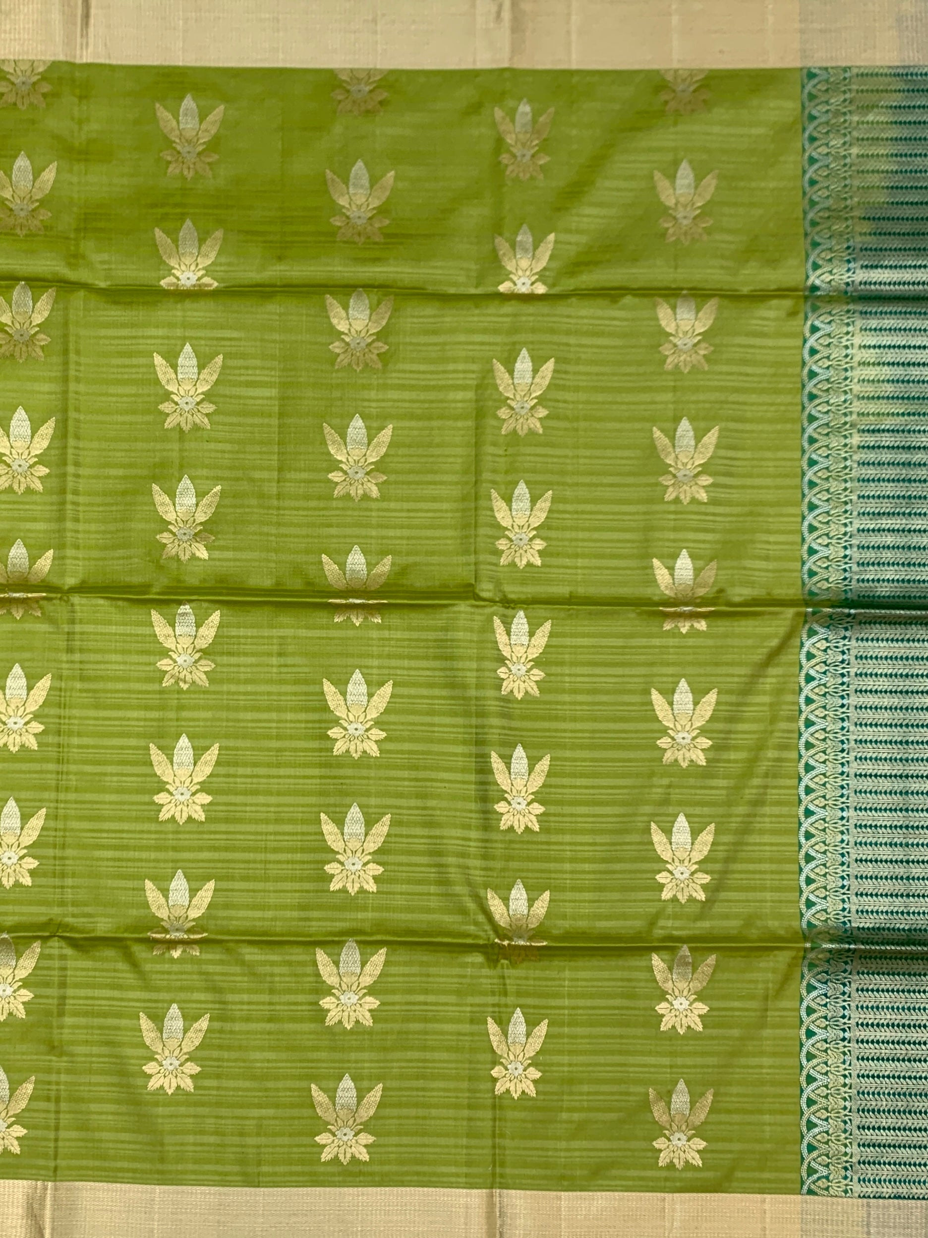 Radiant Light Green & Emerald Soft Silk Saree with Floral Zari Motifs
