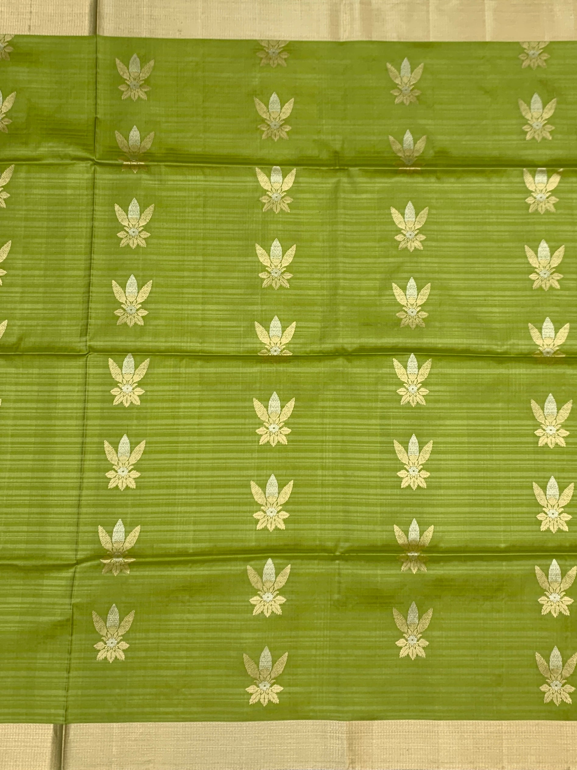 Radiant Light Green & Emerald Soft Silk Saree with Floral Zari Motifs