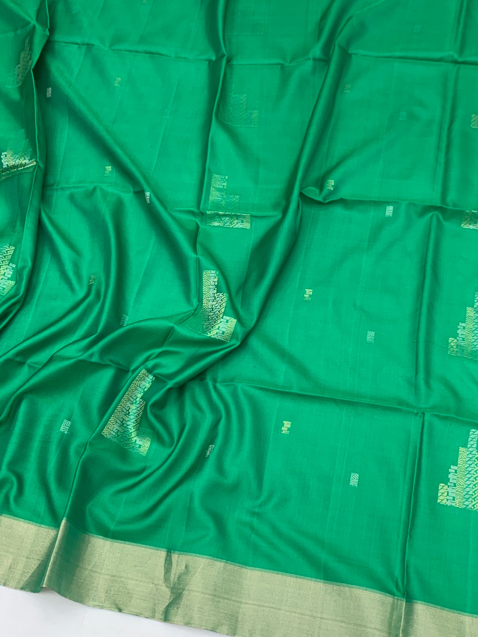 Emerald Geometric Elegance: Handcrafted Soft Silk Saree