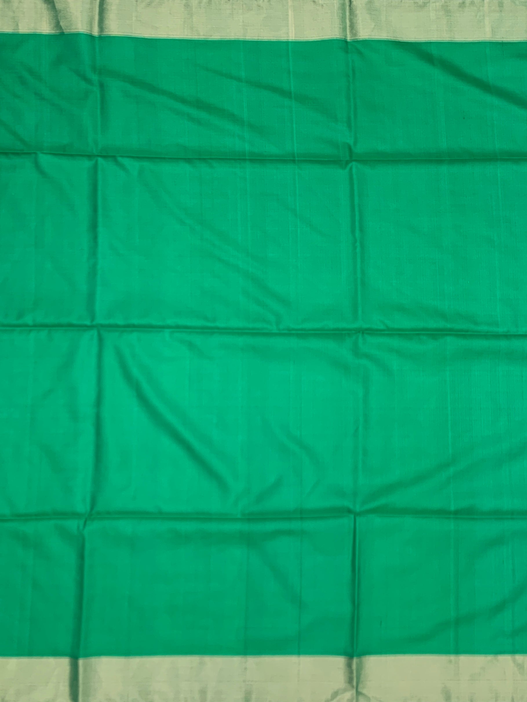 Emerald Geometric Elegance: Handcrafted Soft Silk Saree