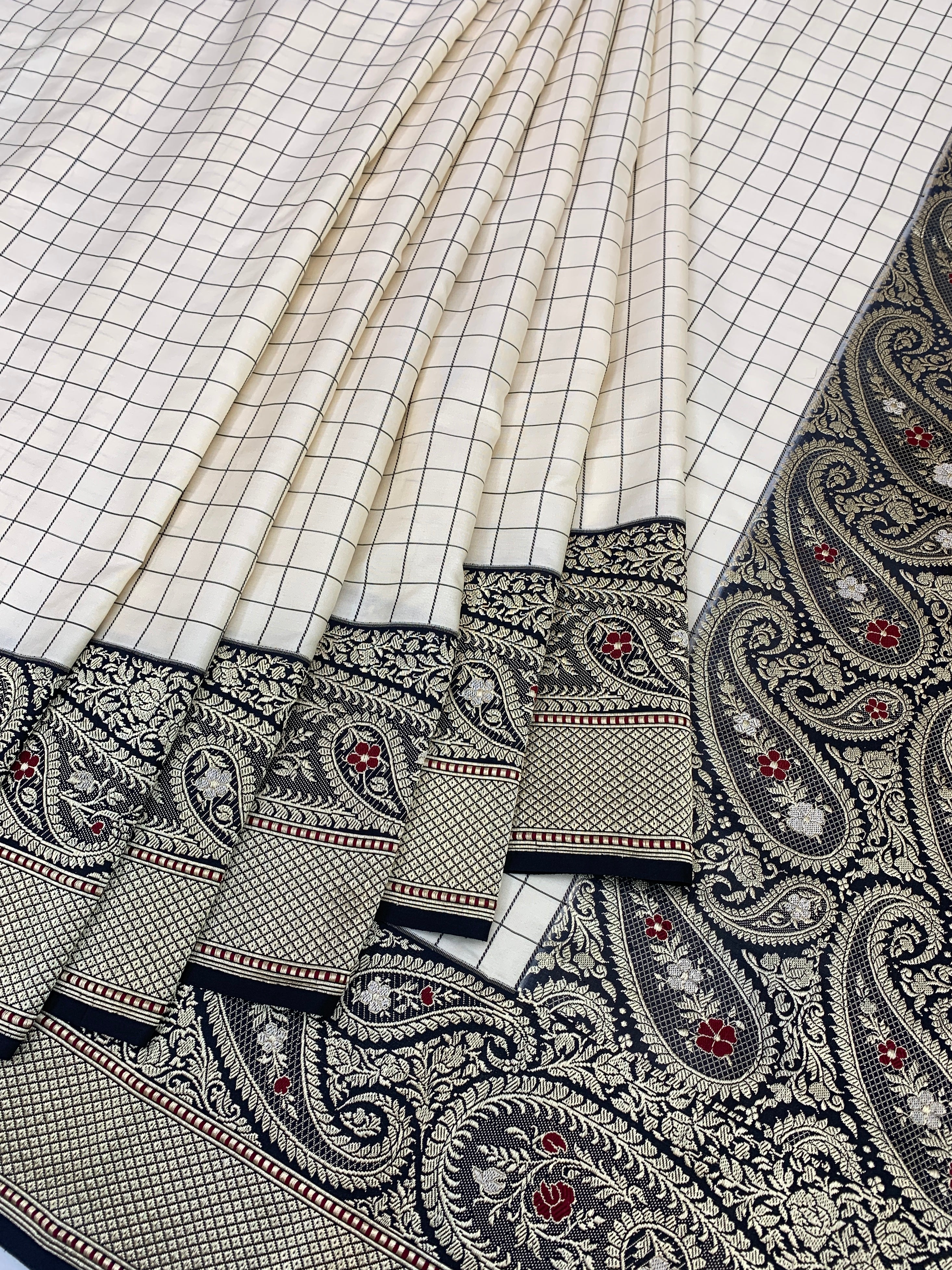 Monochrome Heritage: Cream Grid Banarasi Silk Saree with Ornate Paisley Pallu