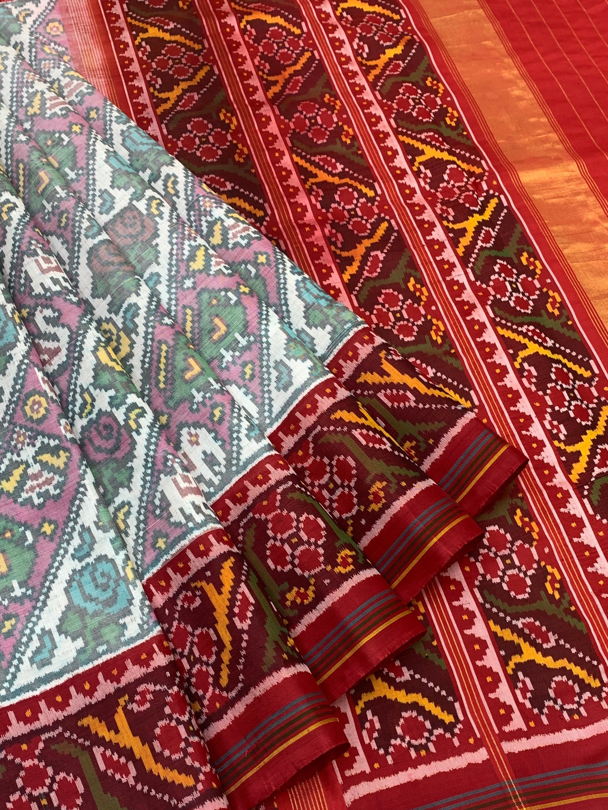 Heritage Splendor: Ivory and Crimson Traditional Patola Silk Saree