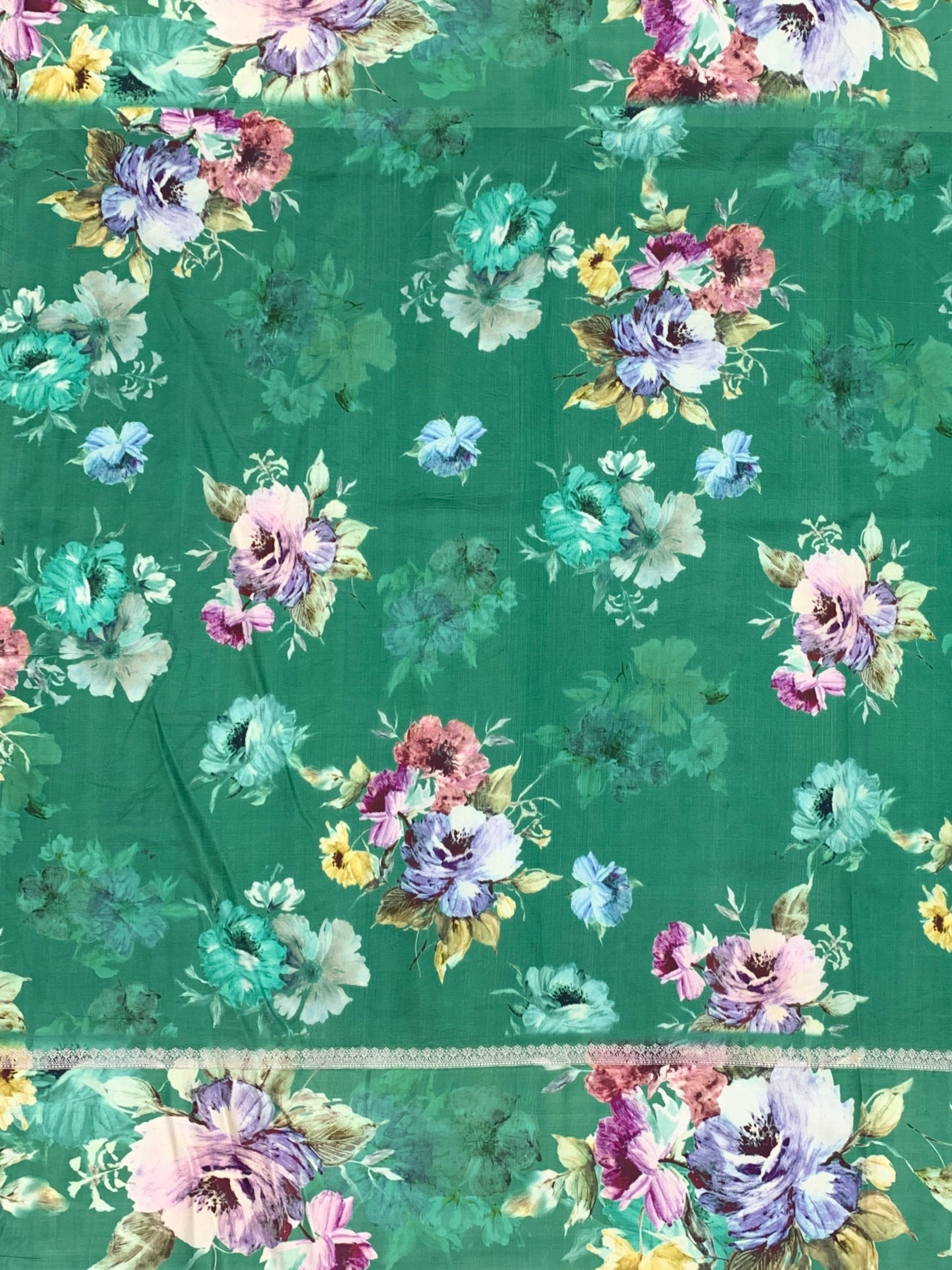 Enchanting Emerald Green Tussar Silk Saree with Floral Border