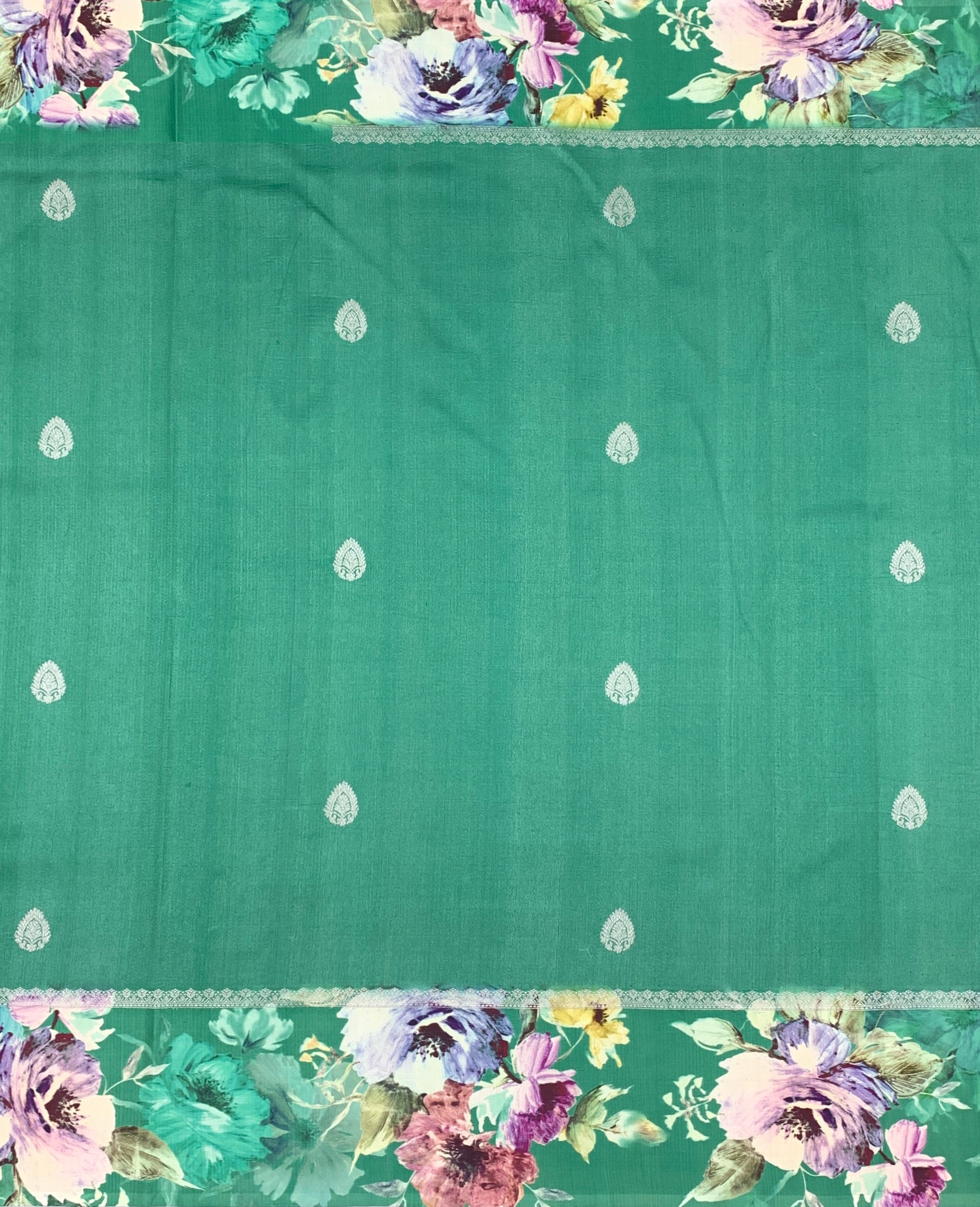 Enchanting Emerald Green Tussar Silk Saree with Floral Border