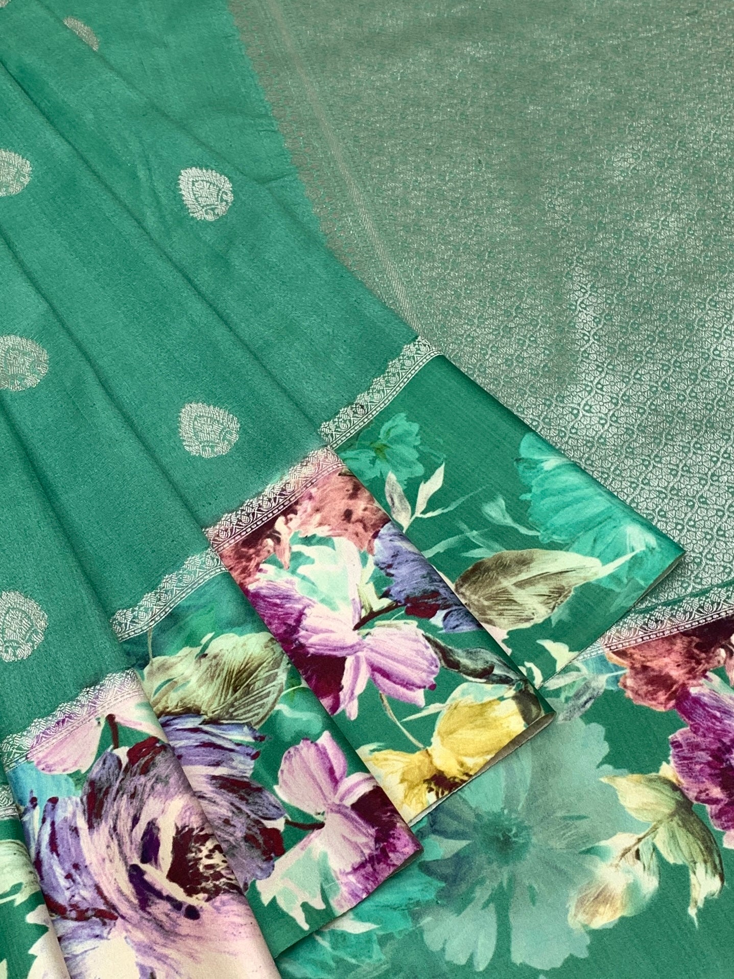 Enchanting Emerald Green Tussar Silk Saree with Floral Border