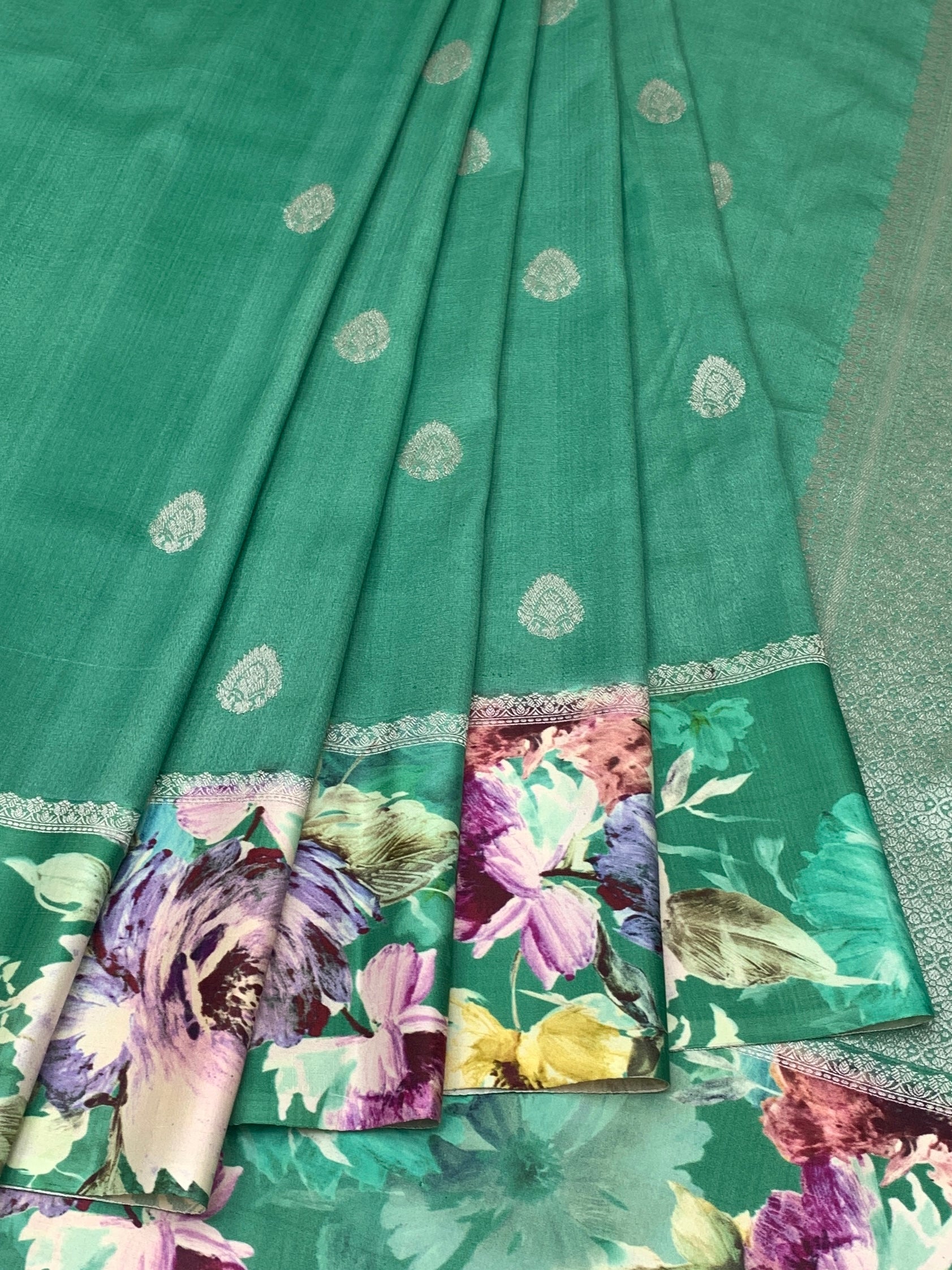 Enchanting Emerald Green Tussar Silk Saree with Floral Border