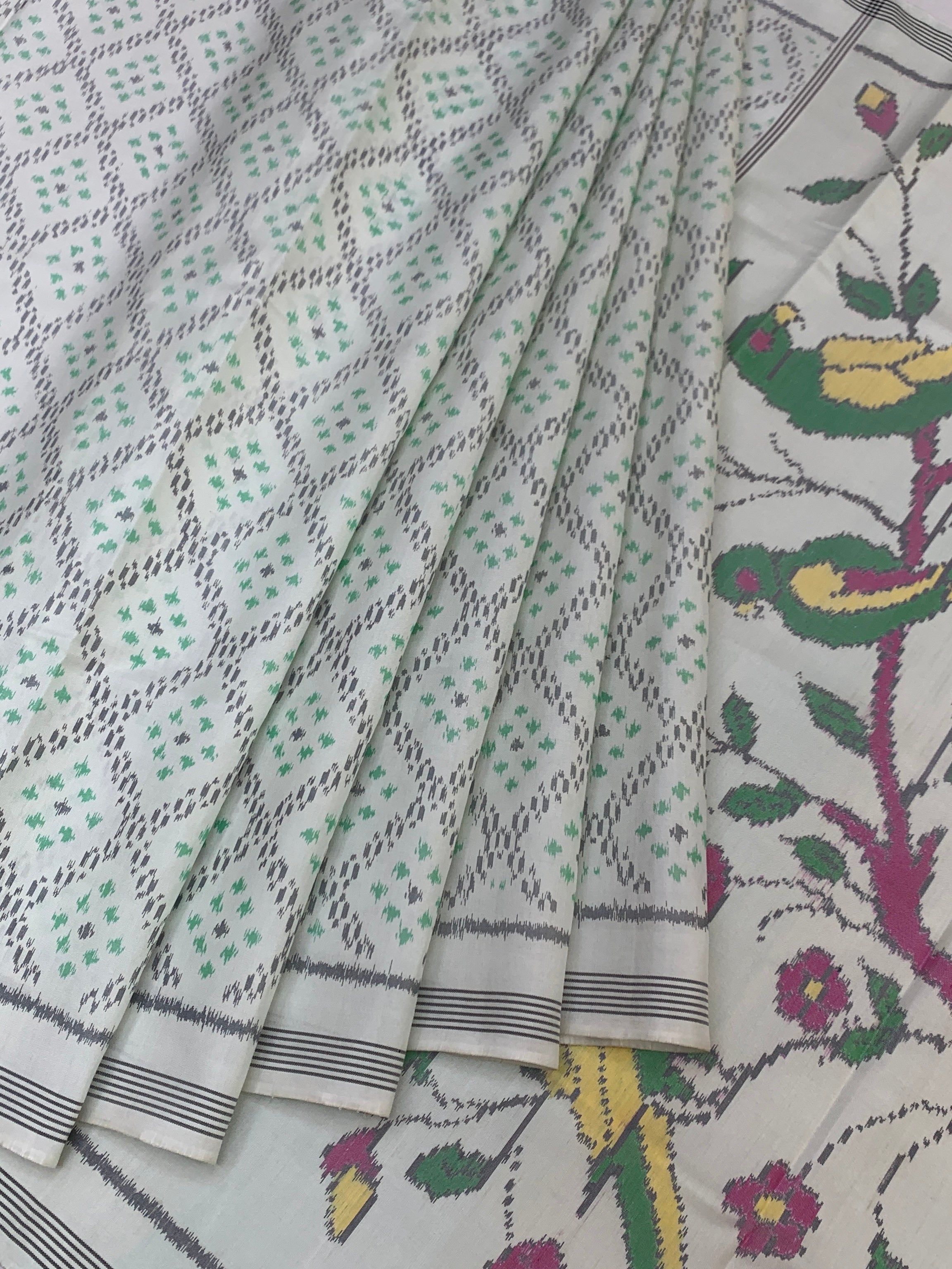 Ivory Handwoven Patola Saree with Vibrant Popat (Parrot) Pallu