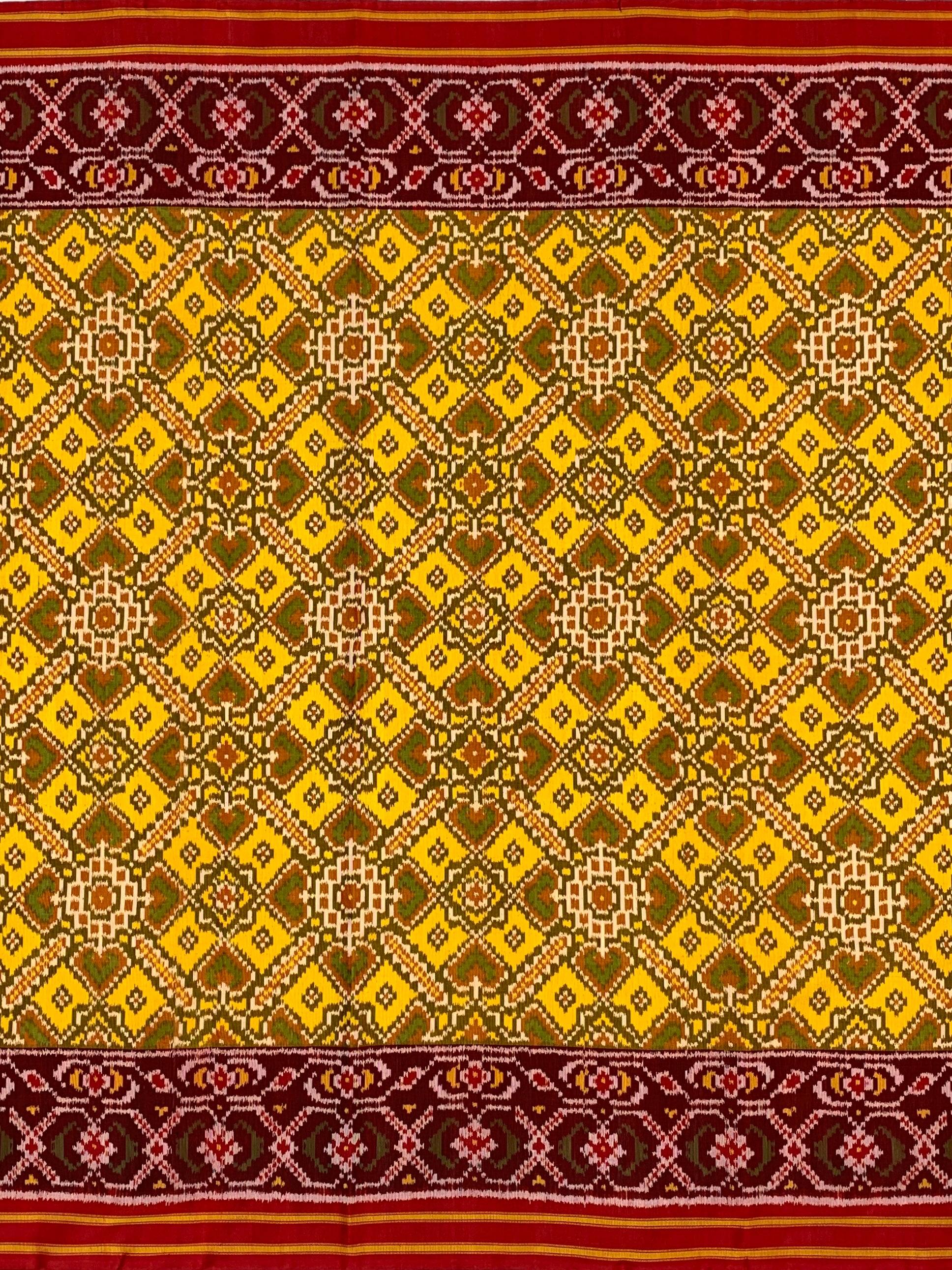 Radiant Heritage: Mustard Yellow and Maroon Traditional Patola Silk Saree