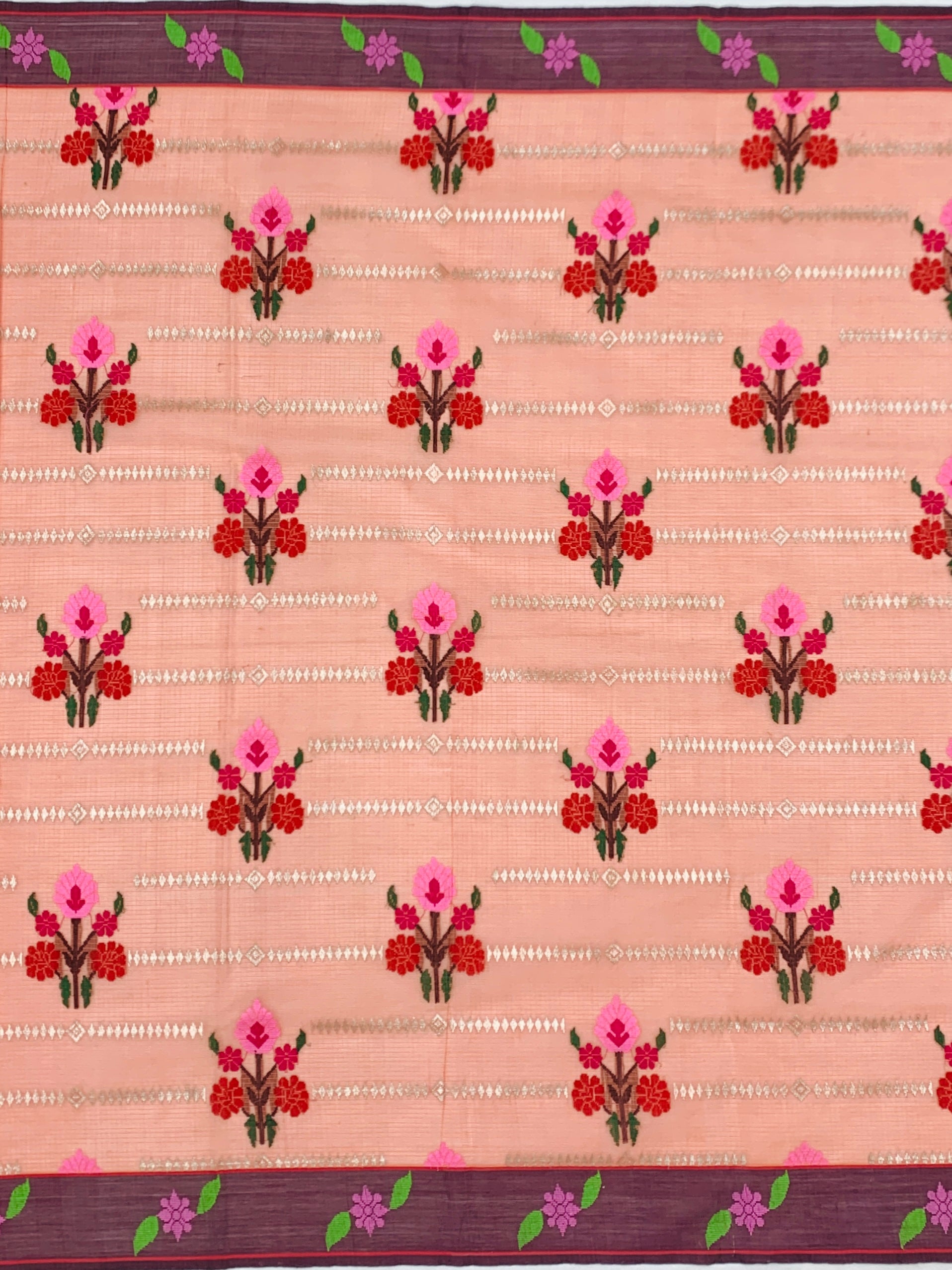 Radiant Peach Zari Kota Saree with Vibrant Floral Weaves