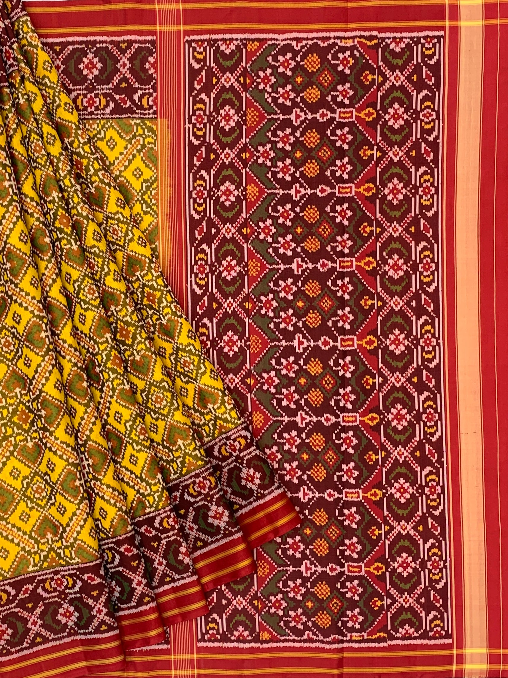 Radiant Heritage: Mustard Yellow and Maroon Traditional Patola Silk Saree